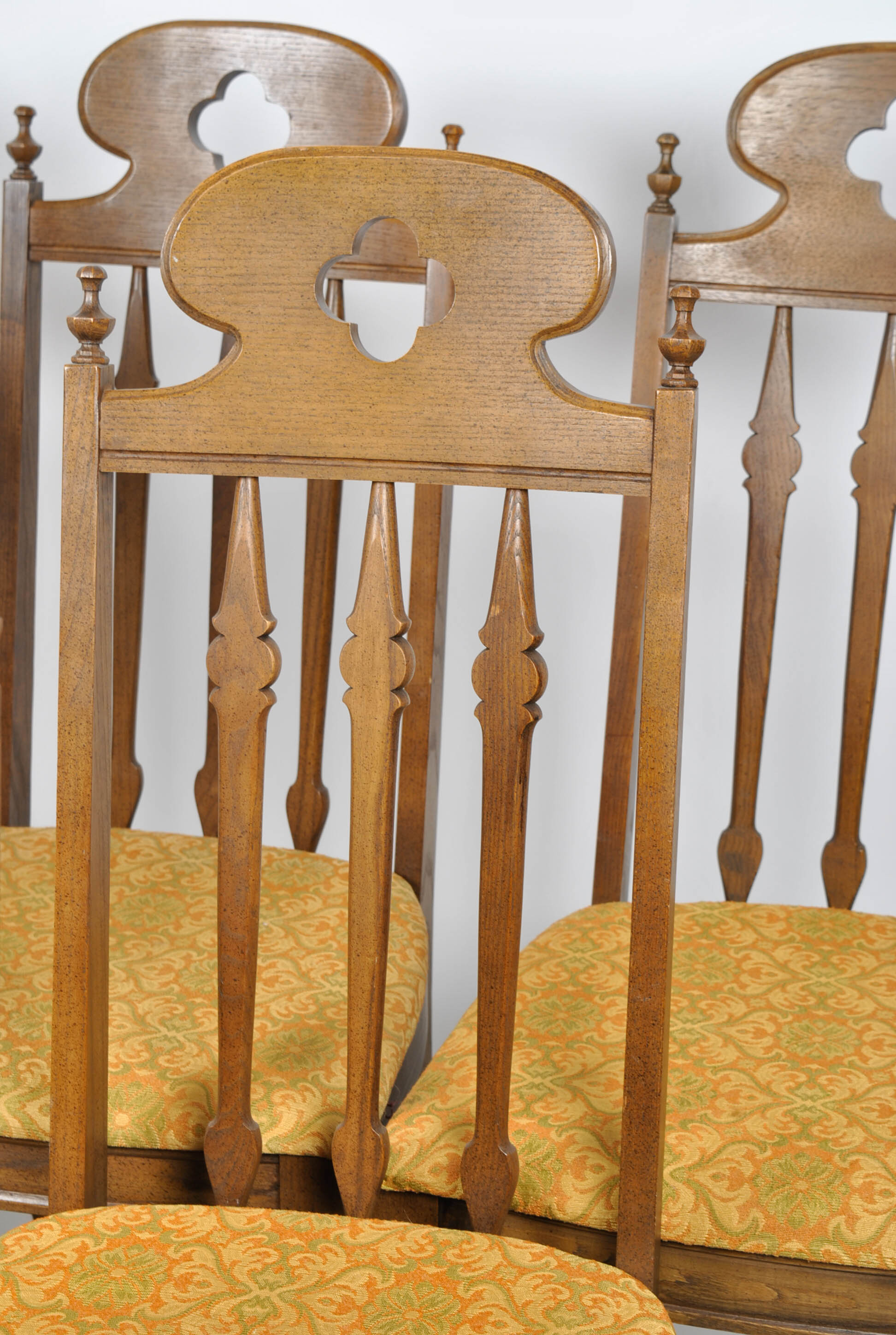 Six Quatrefoil Arch Chairs