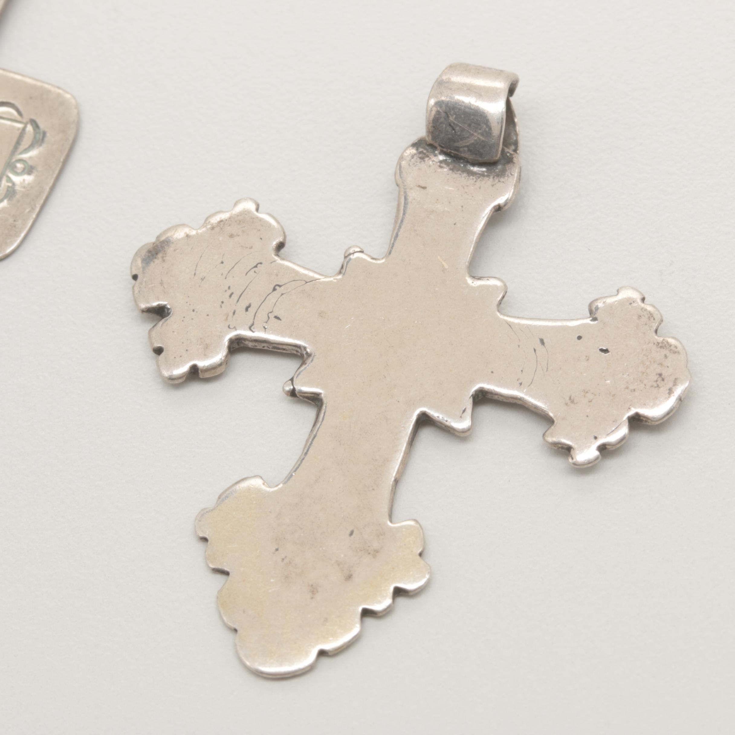 Sterling Silver Jewelry Selection Including Heart and Cross Motifs