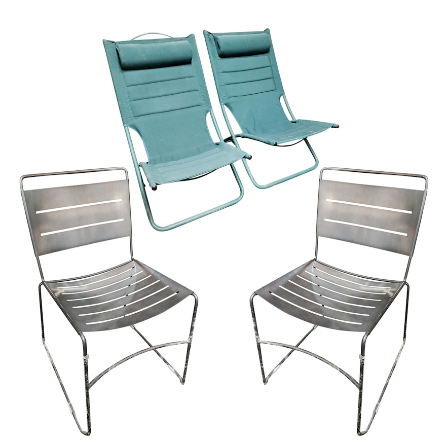 Four Metal Stacking Chairs in Original Packaging & Two Fabric Lounge Chairs