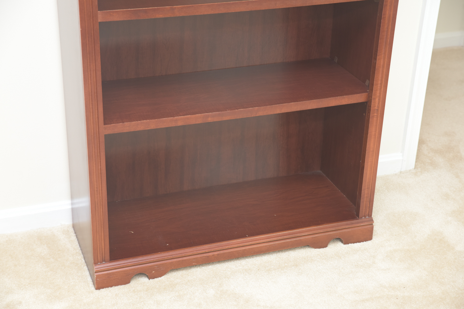 Scallop Accented Wood Finished Laminate Bookcases