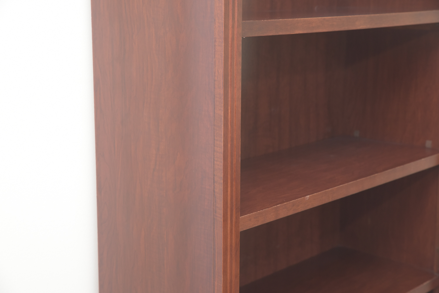 Scallop Accented Wood Finished Laminate Bookcases