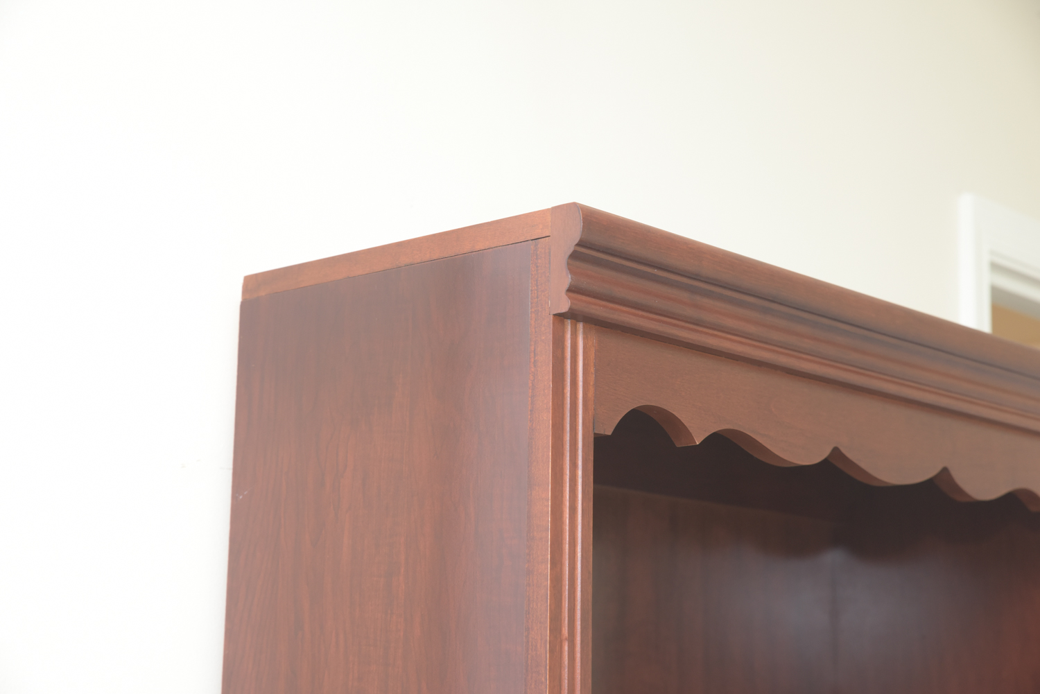 Scallop Accented Wood Finished Laminate Bookcases