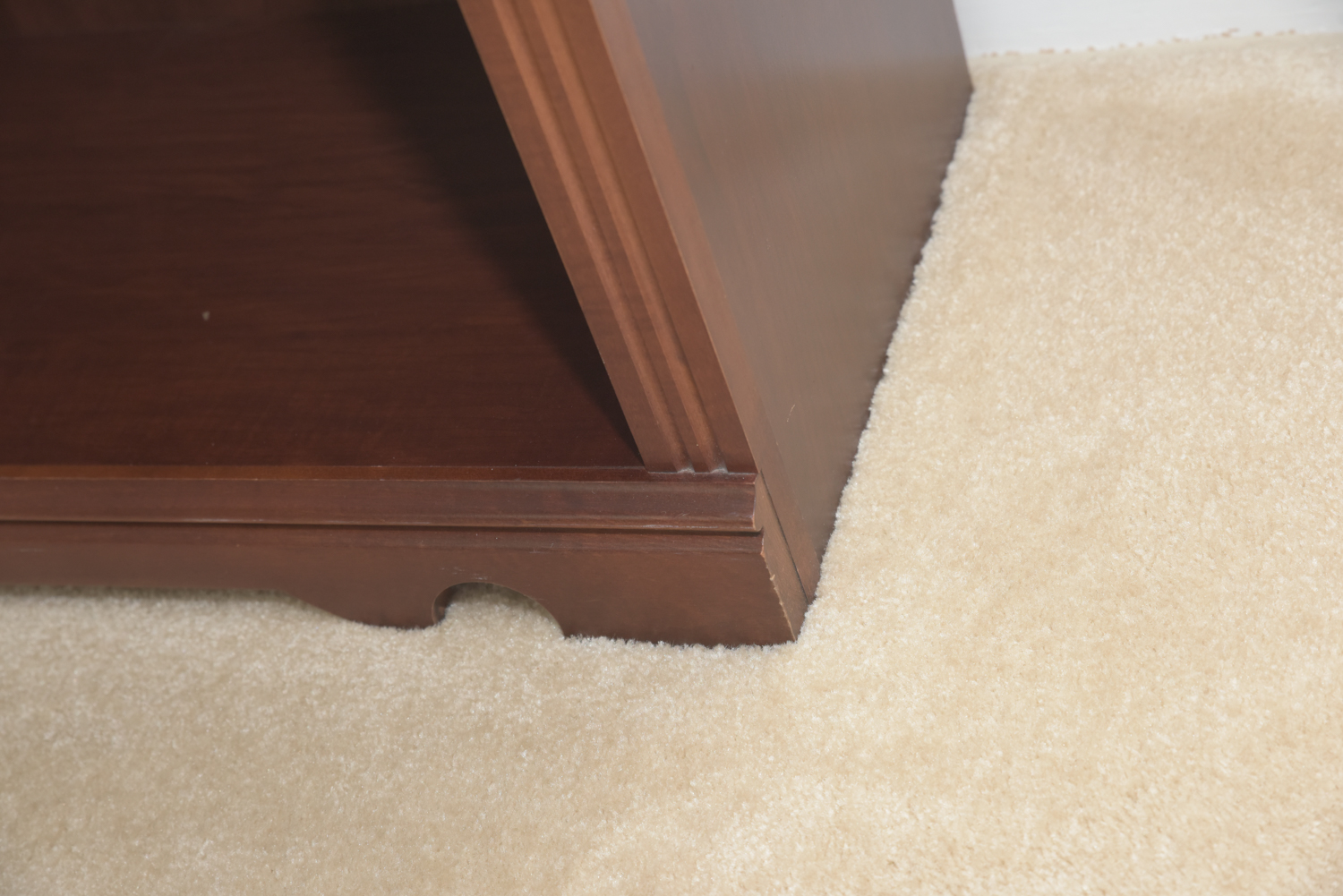 Scallop Accented Wood Finished Laminate Bookcases