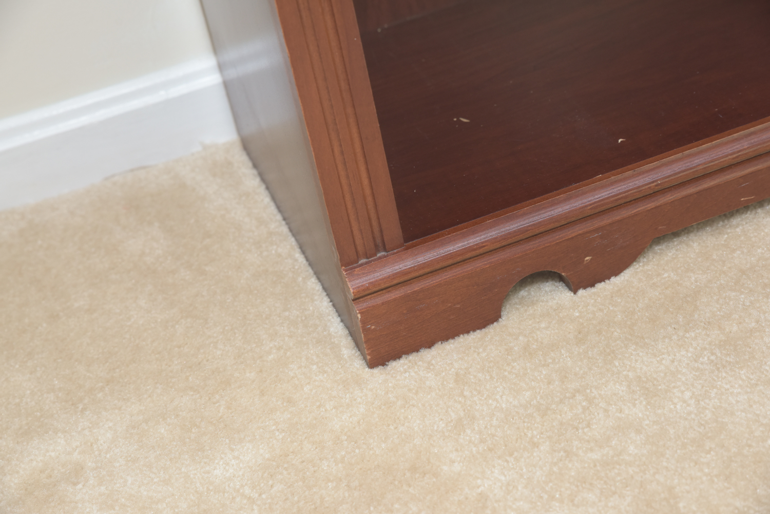 Scallop Accented Wood Finished Laminate Bookcases