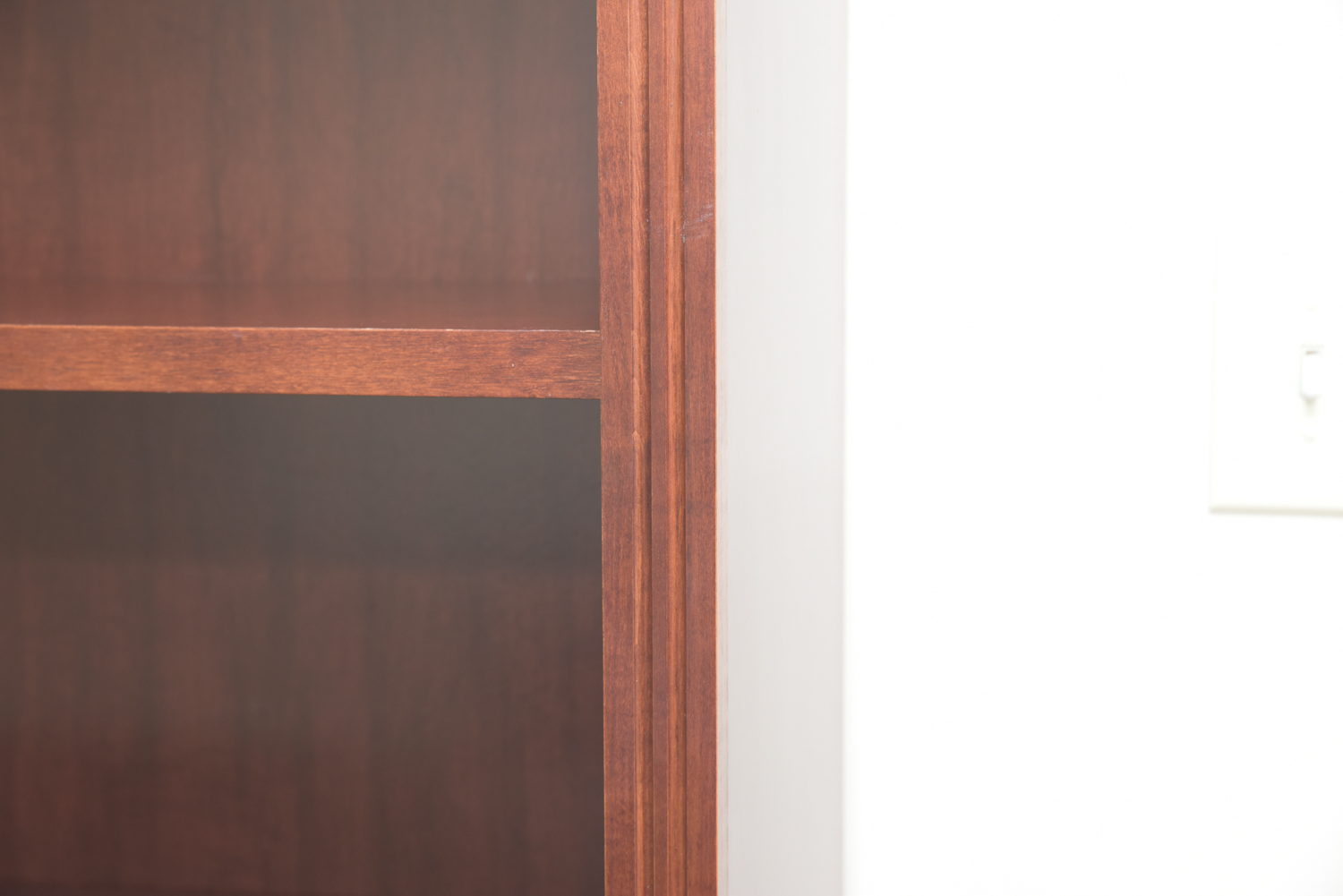 Scallop Accented Wood Finished Laminate Bookcases