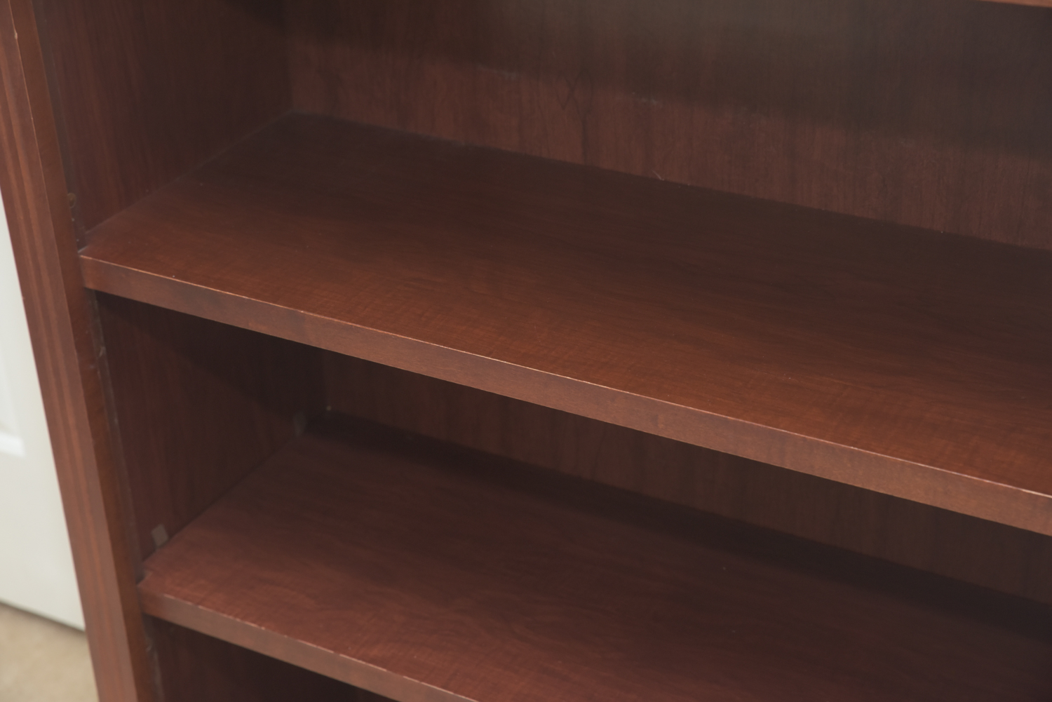 Scallop Accented Wood Finished Laminate Bookcases