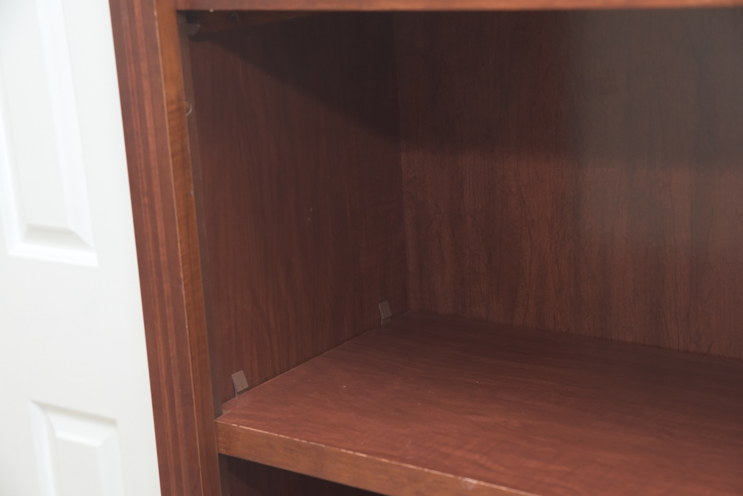 Scallop Accented Wood Finished Laminate Bookcases