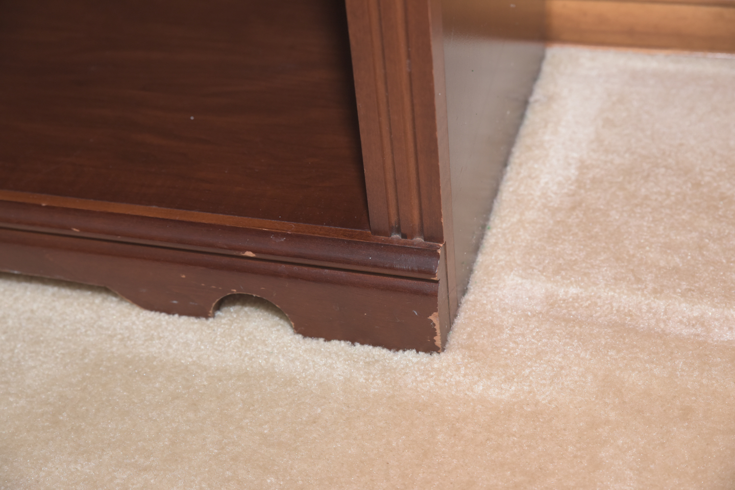 Scallop Accented Wood Finished Laminate Bookcases