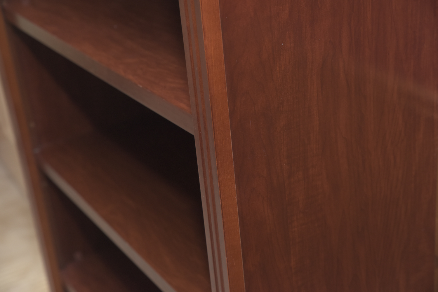 Scallop Accented Wood Finished Laminate Bookcases