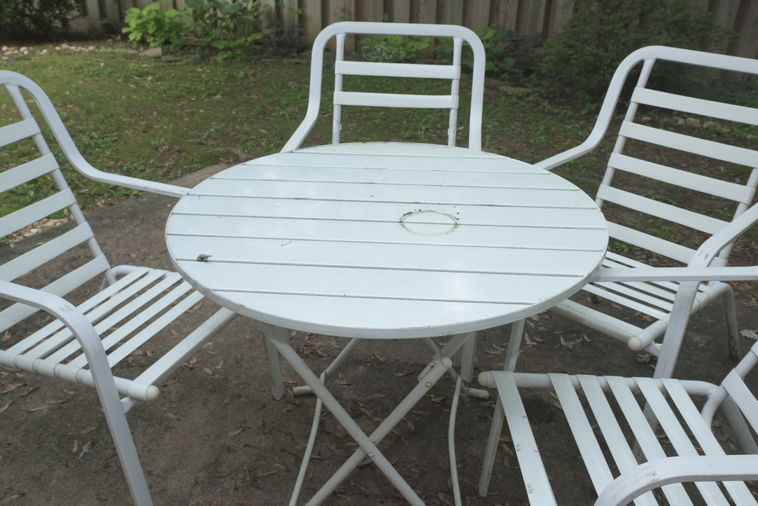 Five-Piece White Metal Patio Set with Seat Cushions