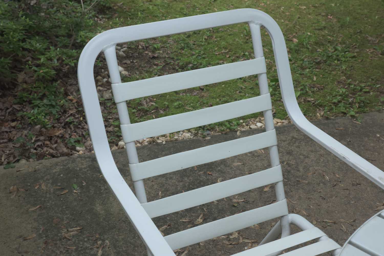 Five-Piece White Metal Patio Set with Seat Cushions