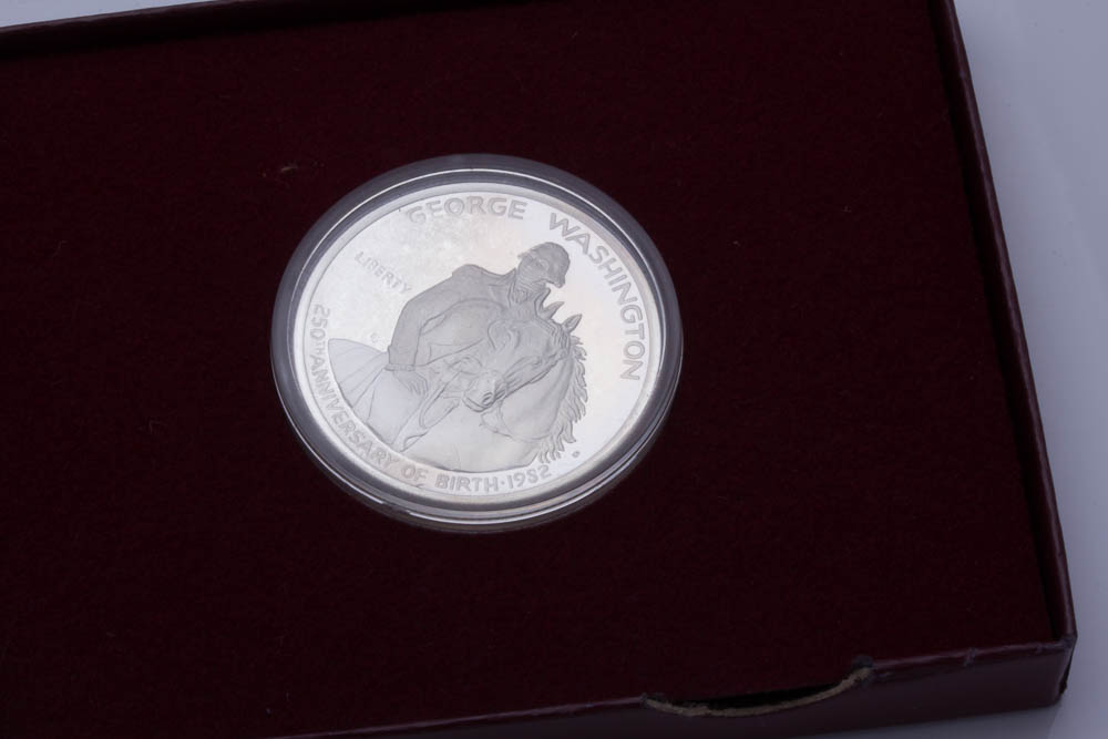 Silver Eisenhower Dollar and Two Commemorative Silver Half Dollars