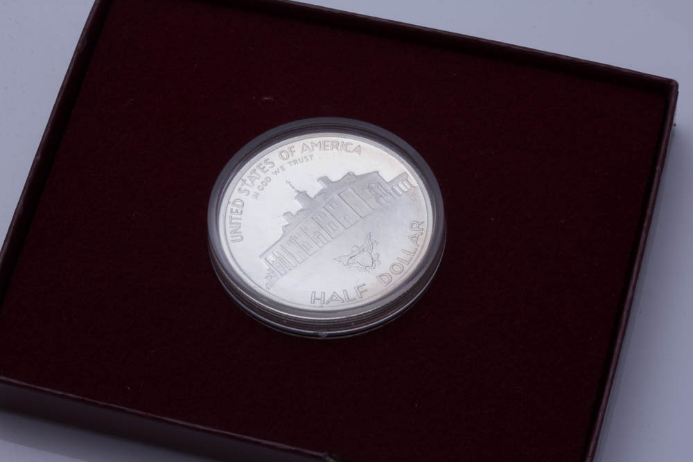 Silver Eisenhower Dollar and Two Commemorative Silver Half Dollars