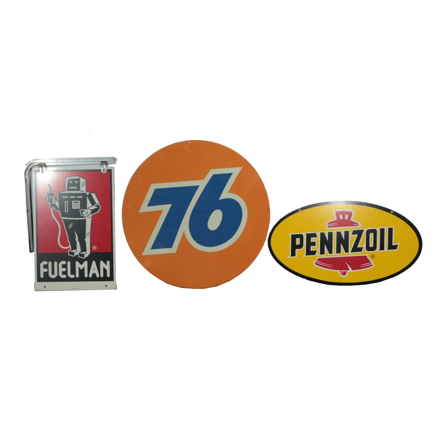 Metal Gas Station Signage Including Pennzoil, 76, and Fuelman