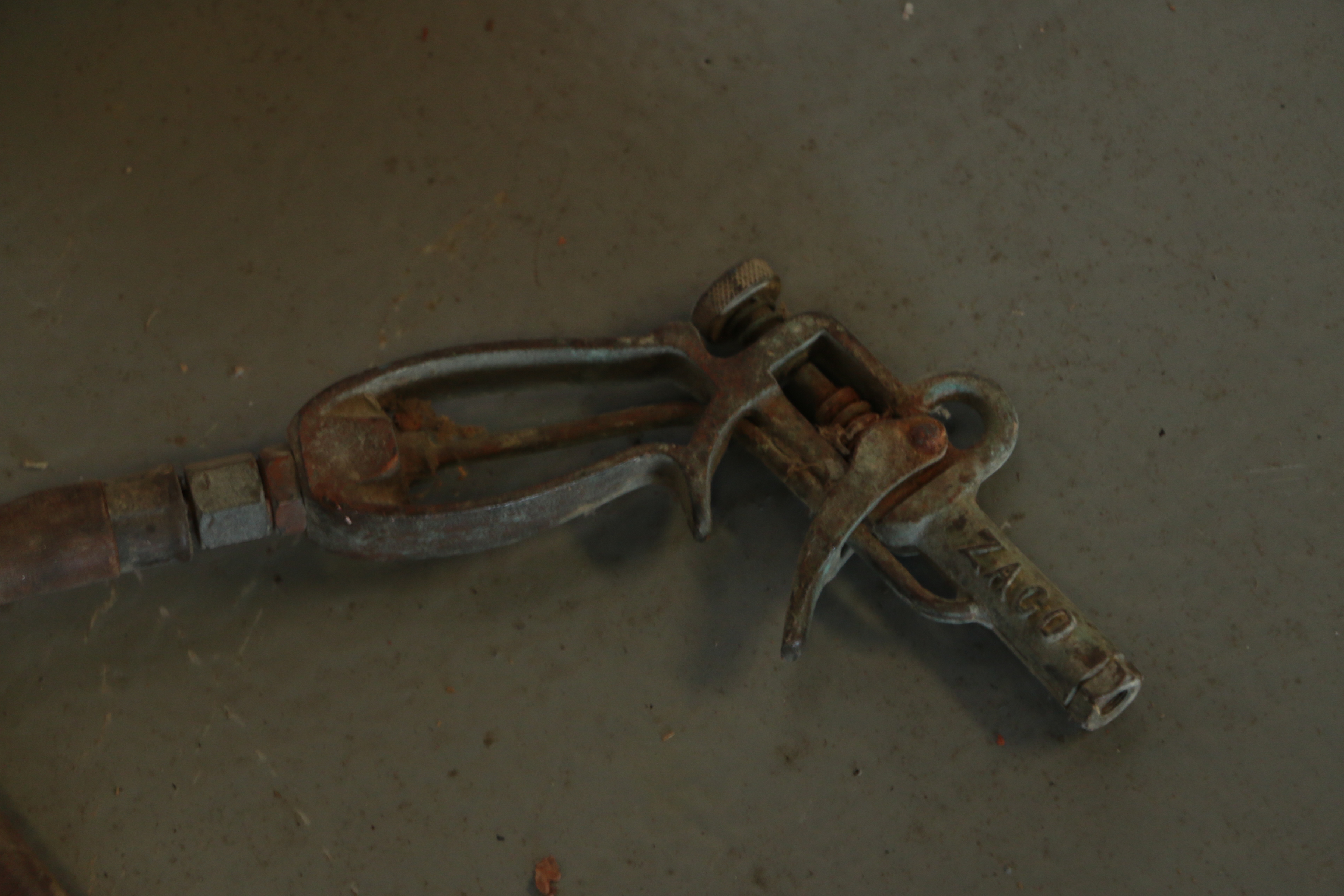 Circa 1930s Zaco Super Penetrating Oil Tank and Dispenser