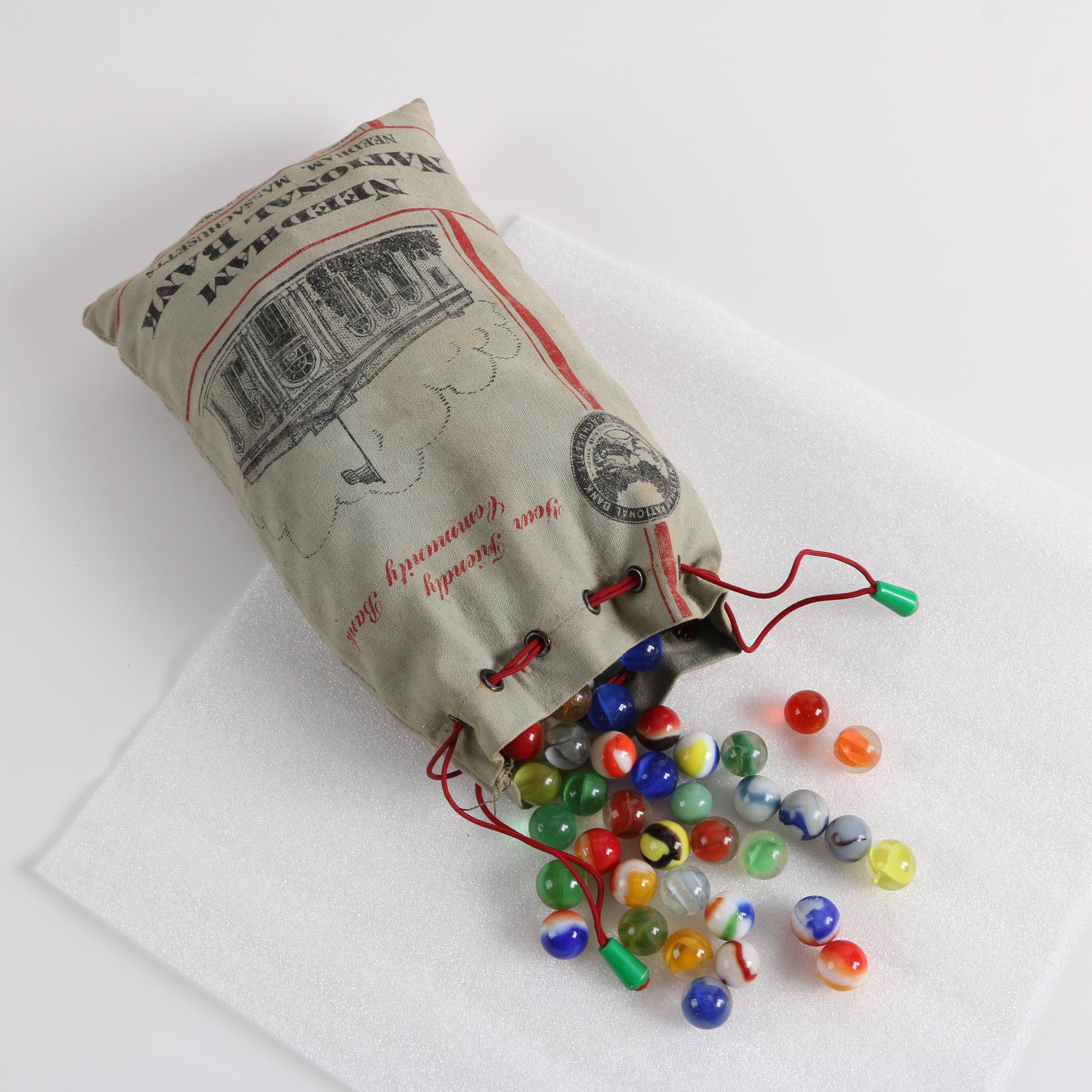Glass Marble Collection in a Needham National Bank Canvas Drawstring Bag