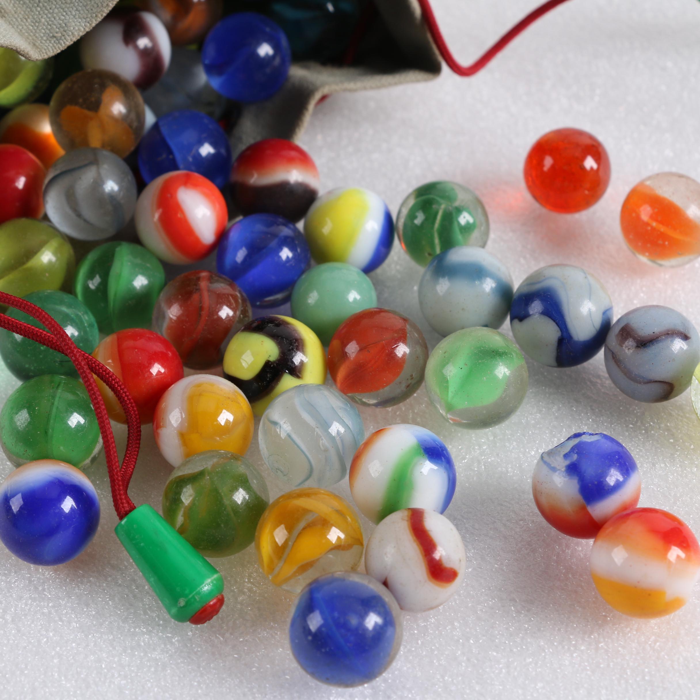 Glass Marble Collection in a Needham National Bank Canvas Drawstring Bag