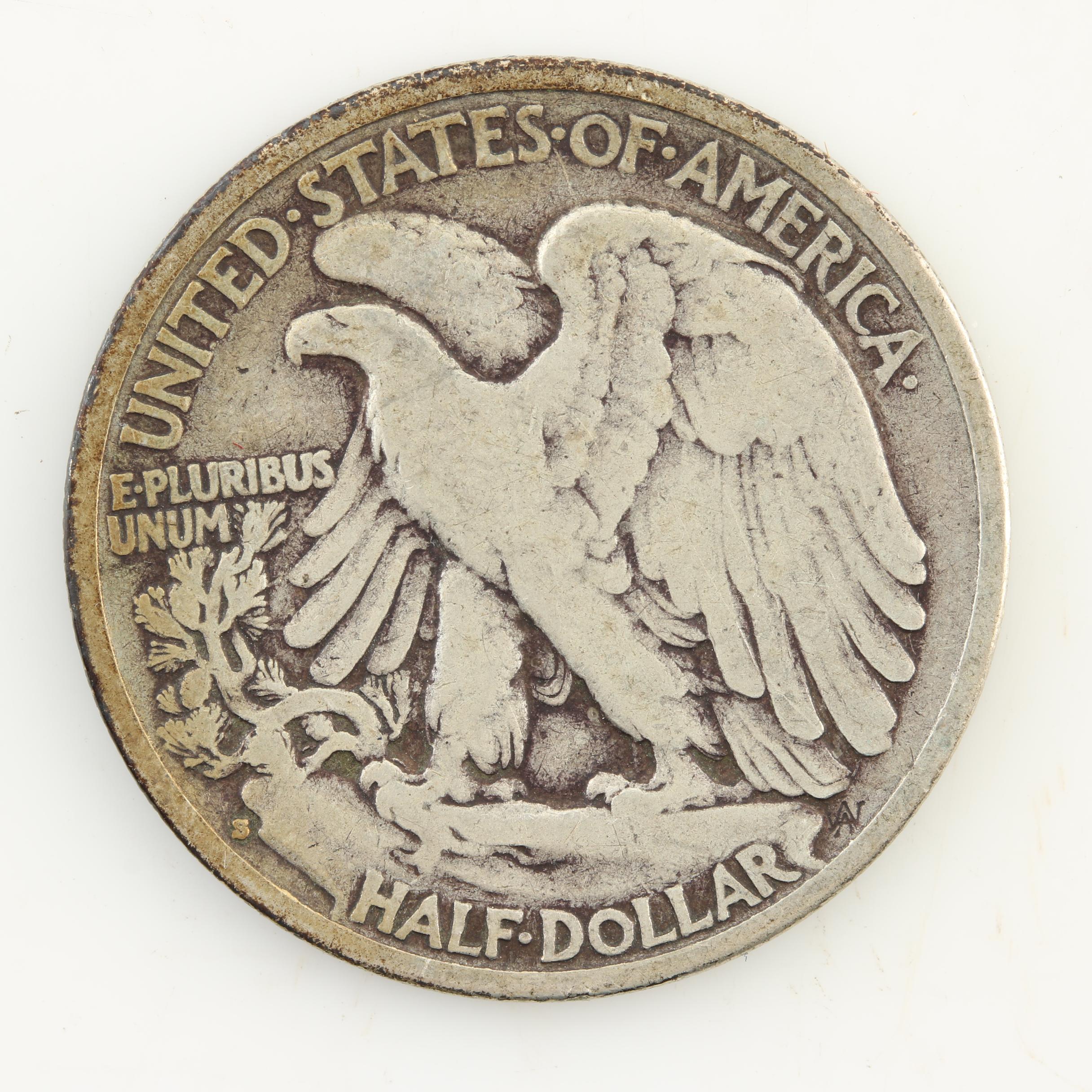 Seven Walking Liberty Silver Half Dollars from the 1930s