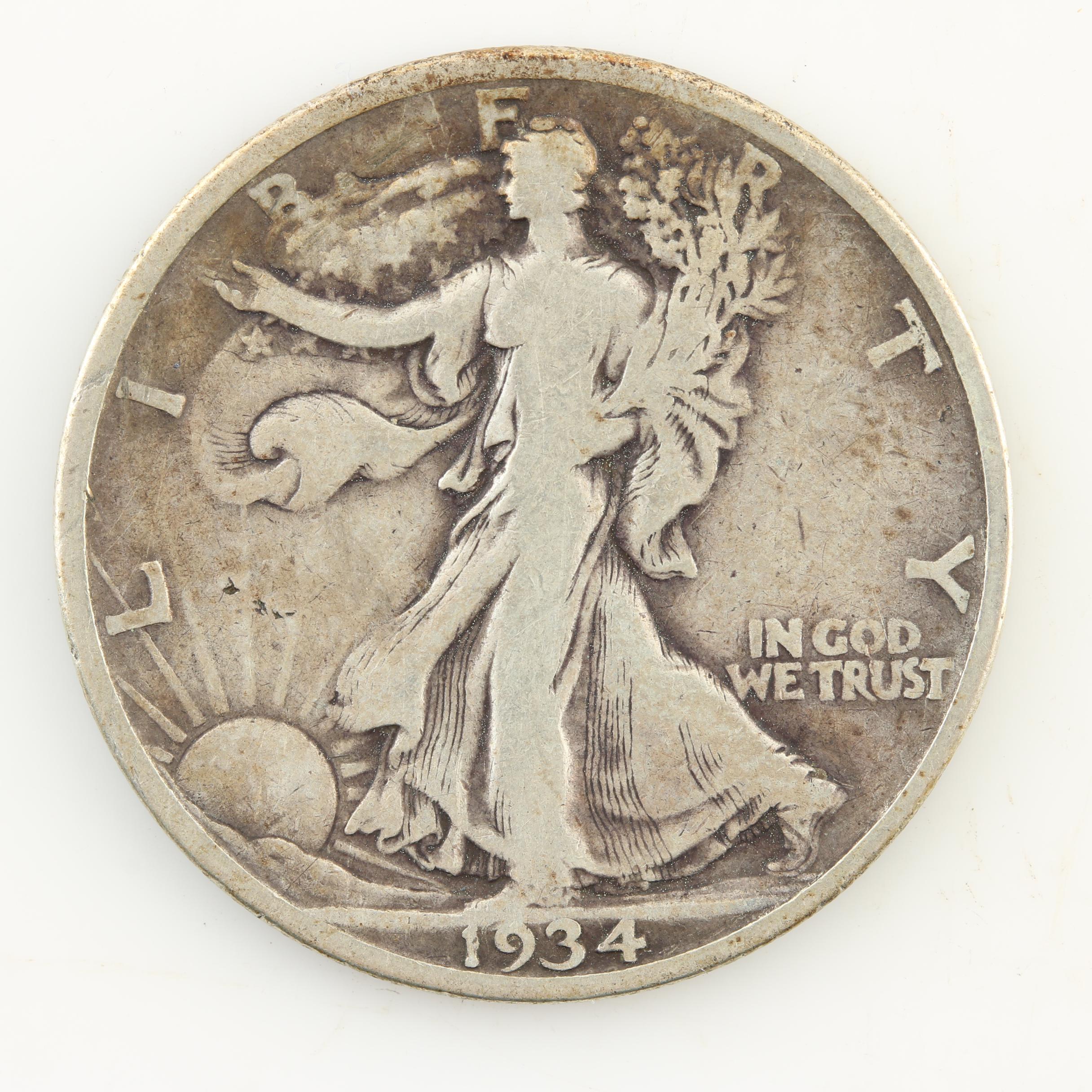 Seven Walking Liberty Silver Half Dollars from the 1930s
