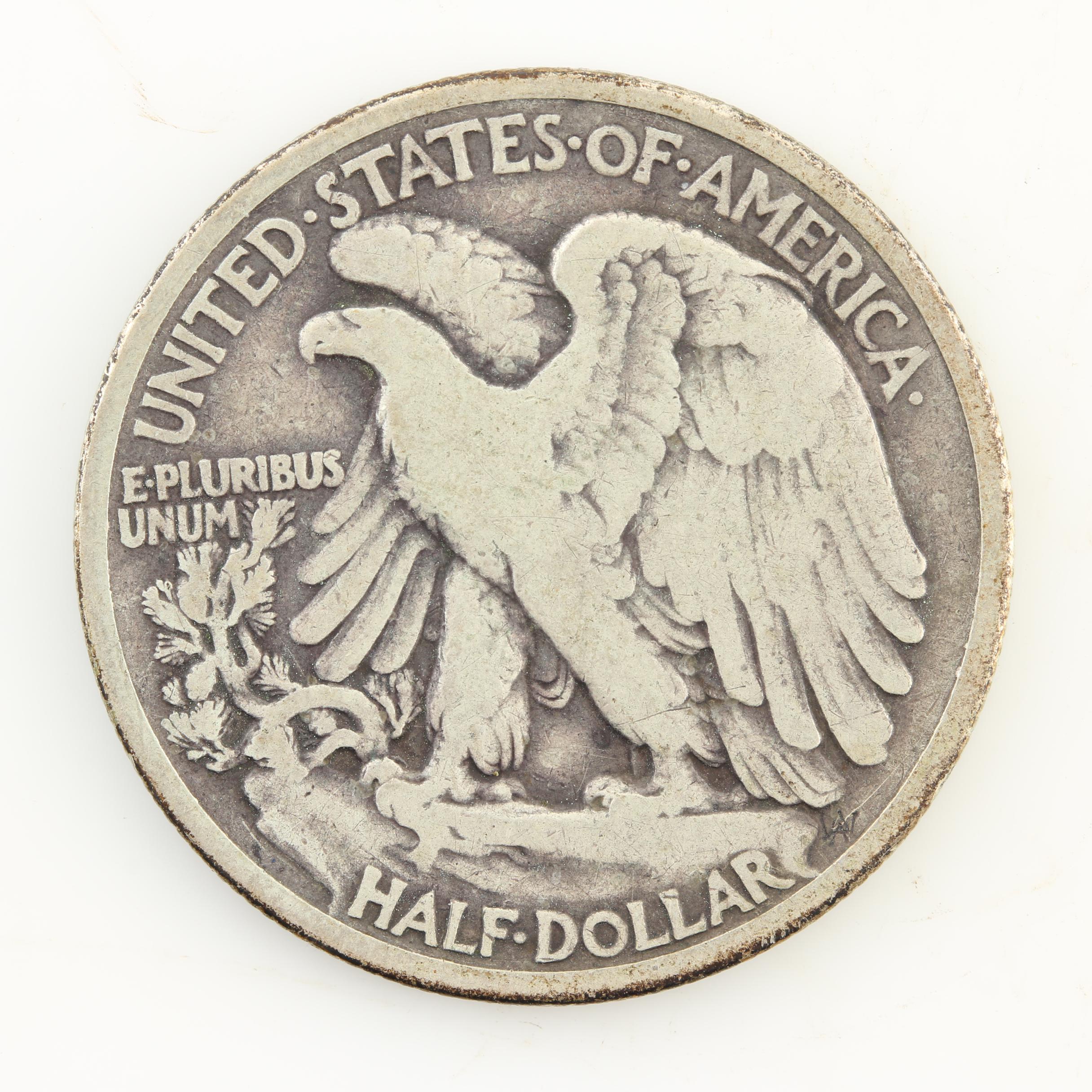 Seven Walking Liberty Silver Half Dollars from the 1930s