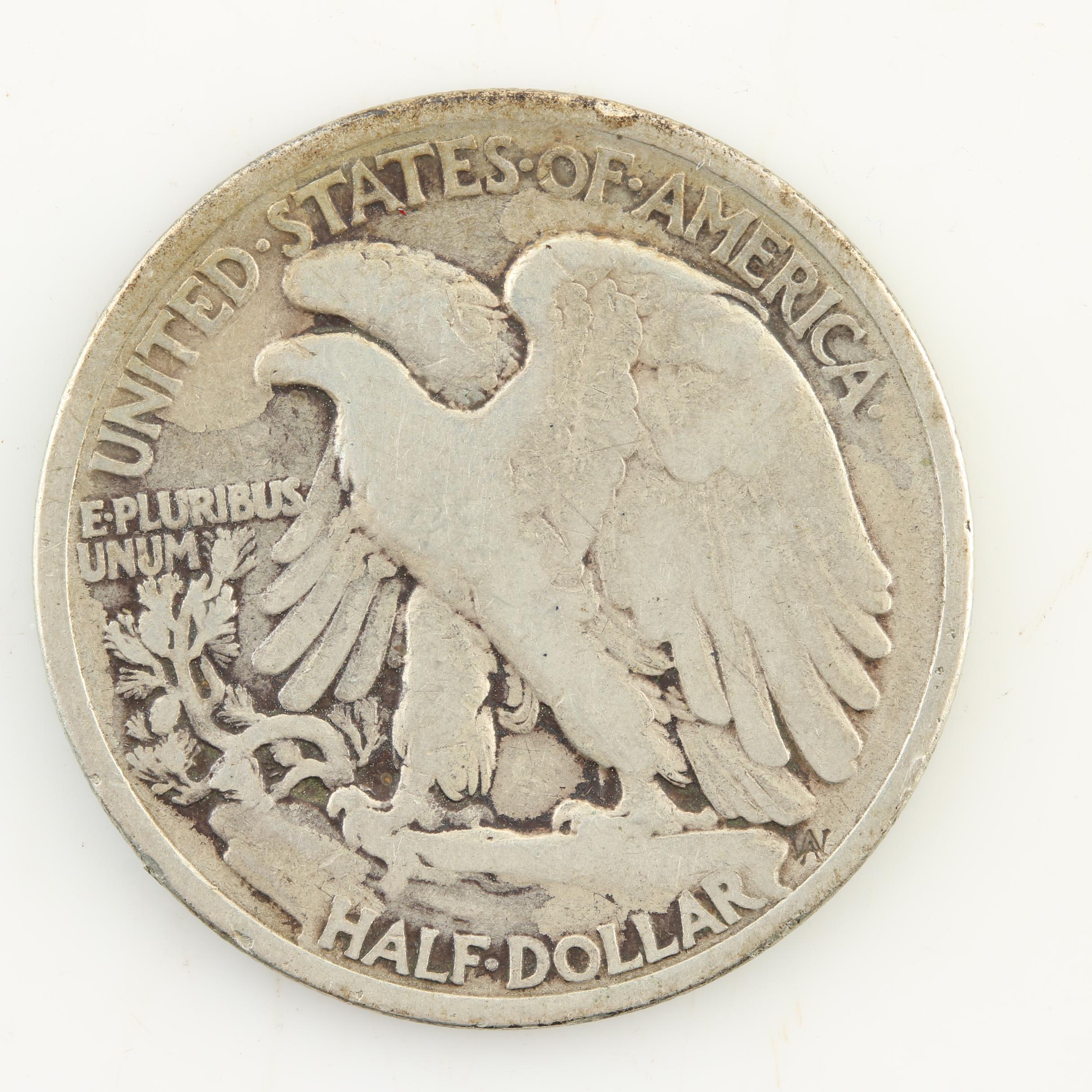 Seven Walking Liberty Silver Half Dollars from the 1930s