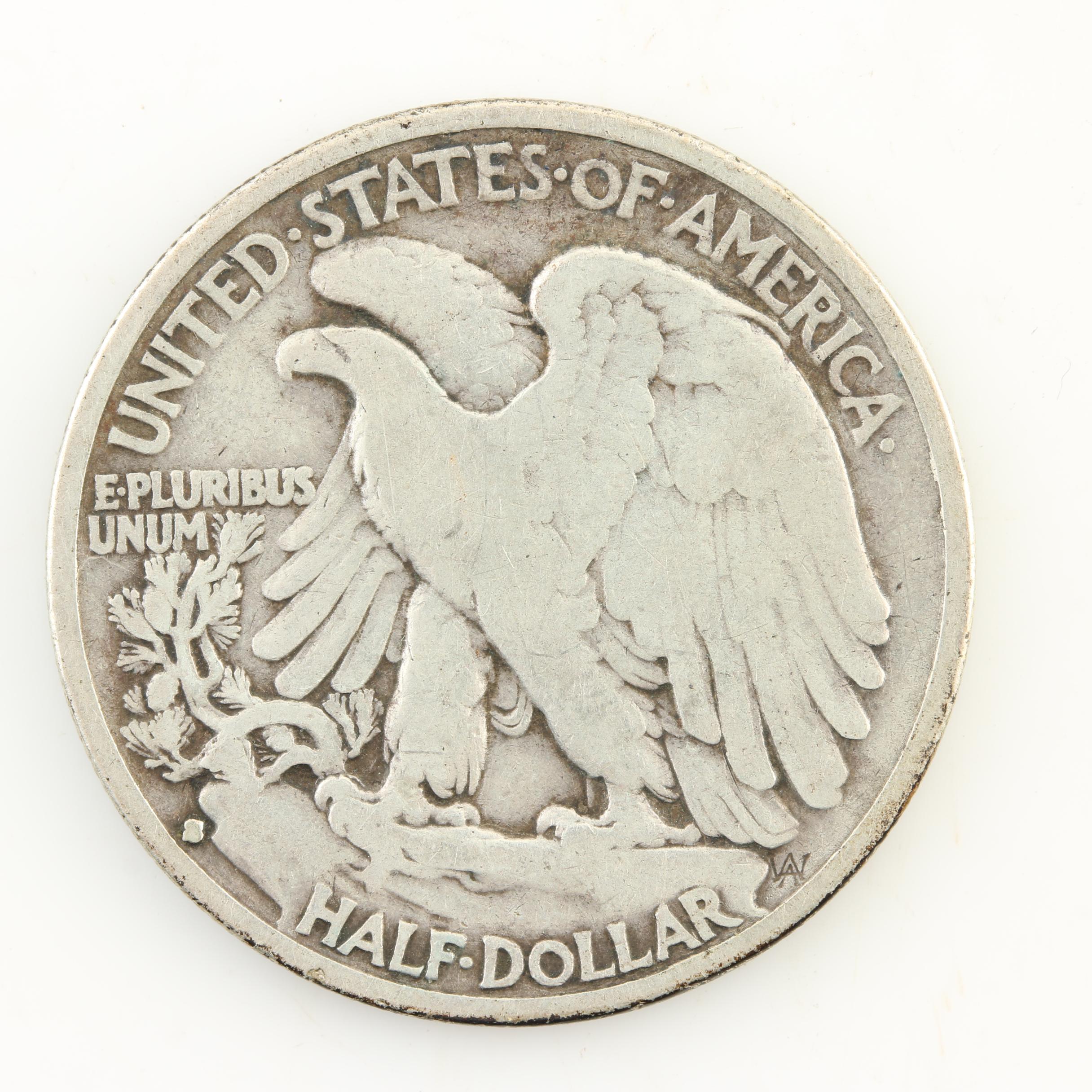 Seven Walking Liberty Silver Half Dollars from the 1930s