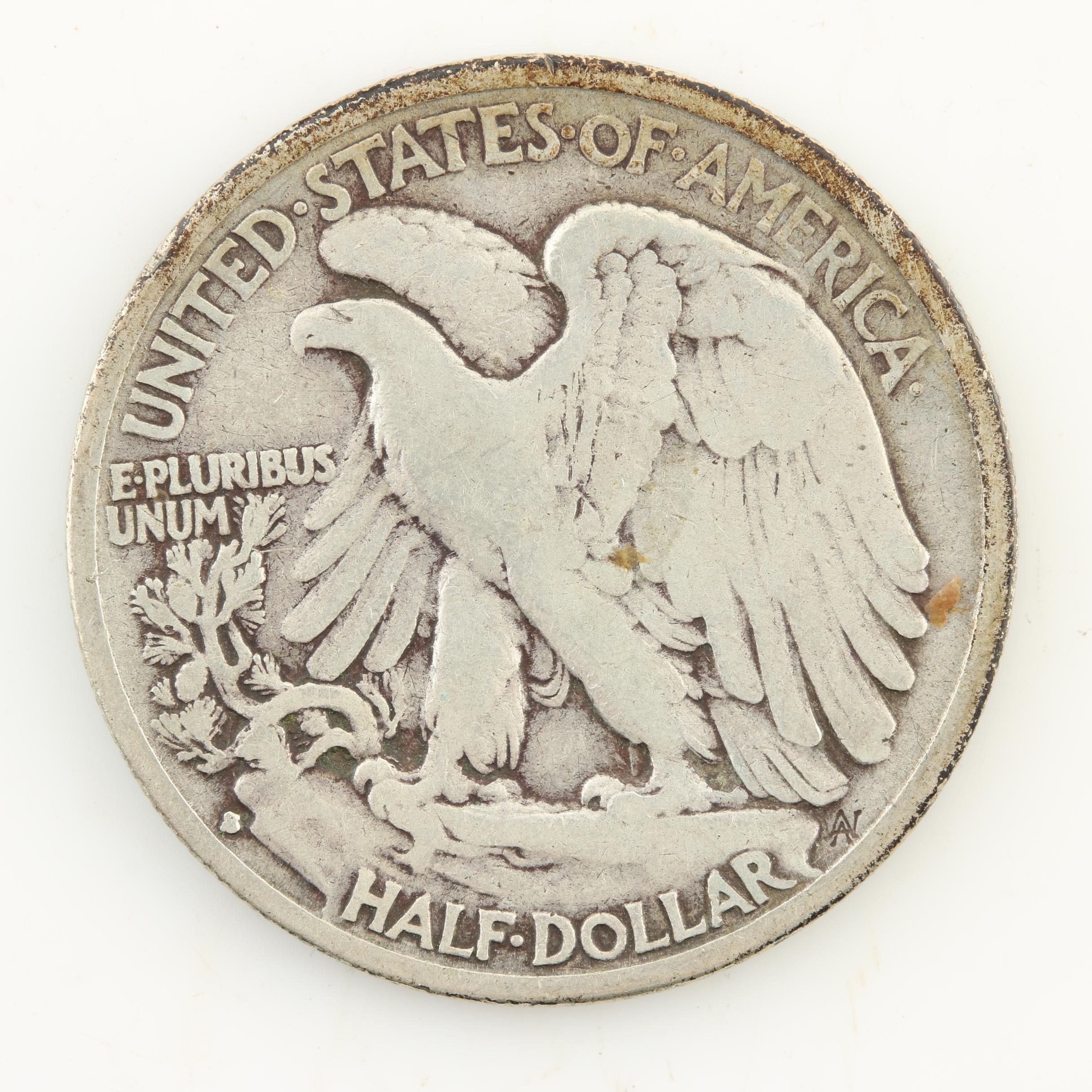 Seven Walking Liberty Silver Half Dollars from the 1930s