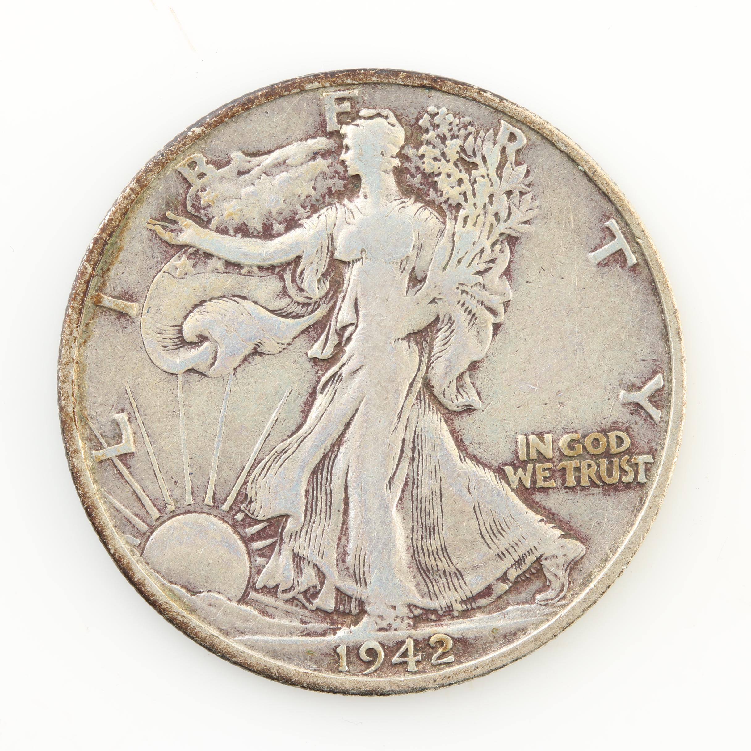 Eight Walking Liberty Silver Half Dollars from the Early 1940s