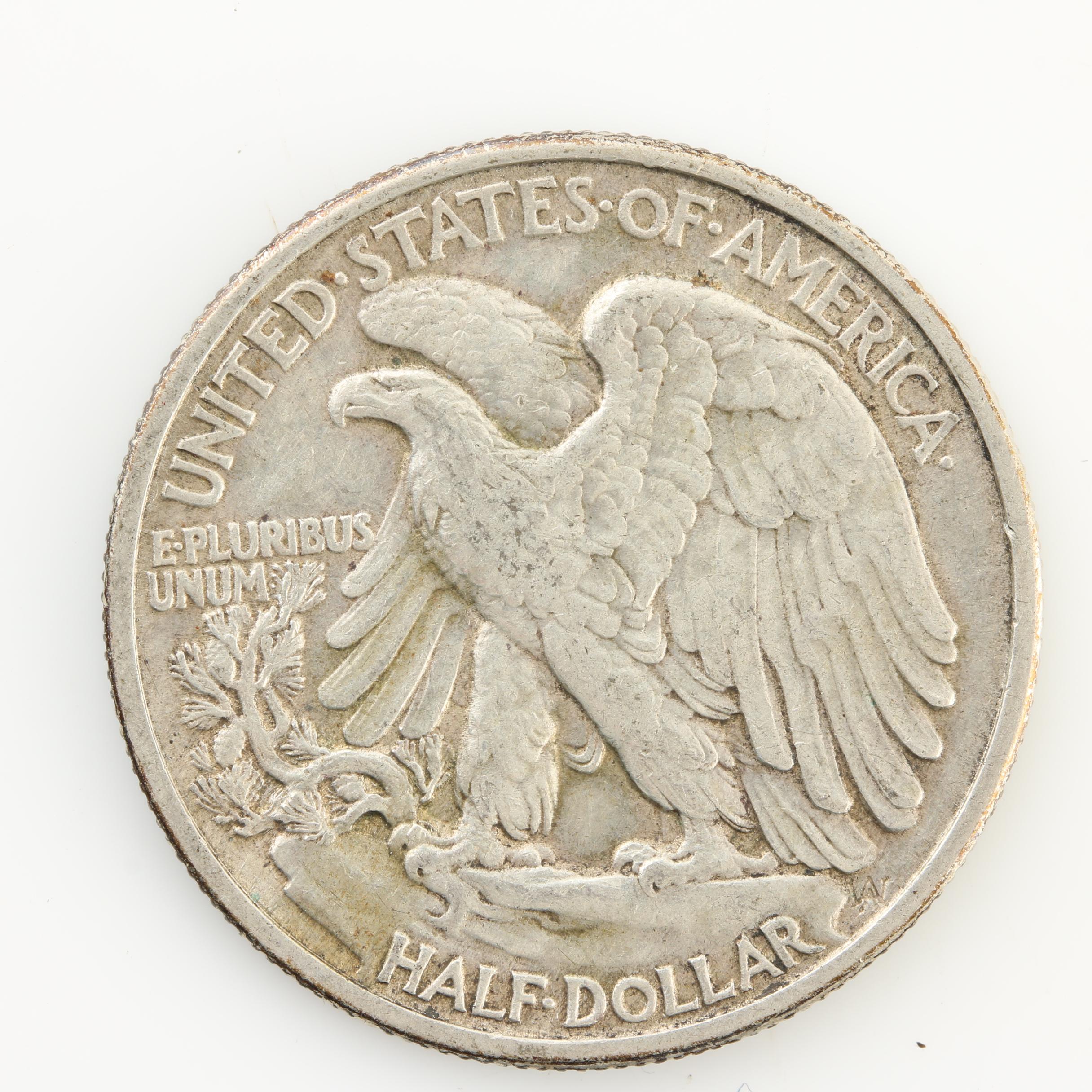 Eight Walking Liberty Silver Half Dollars from the Early 1940s