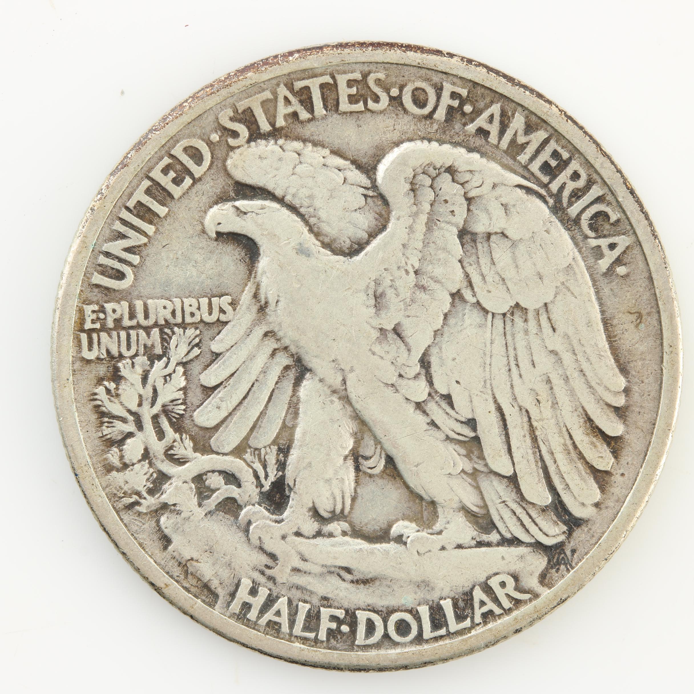 Eight Walking Liberty Silver Half Dollars from the Early 1940s