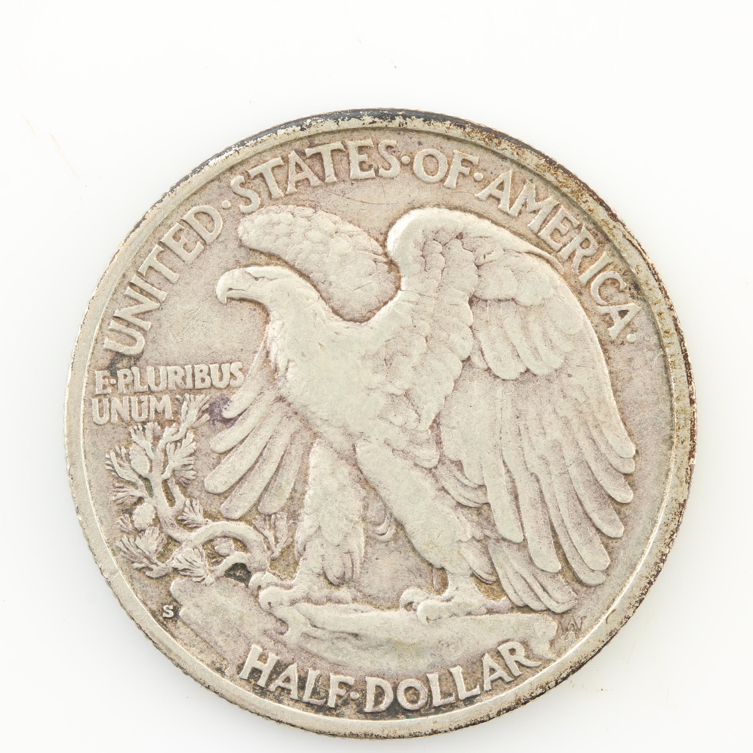 Eight Walking Liberty Silver Half Dollars from the Early 1940s