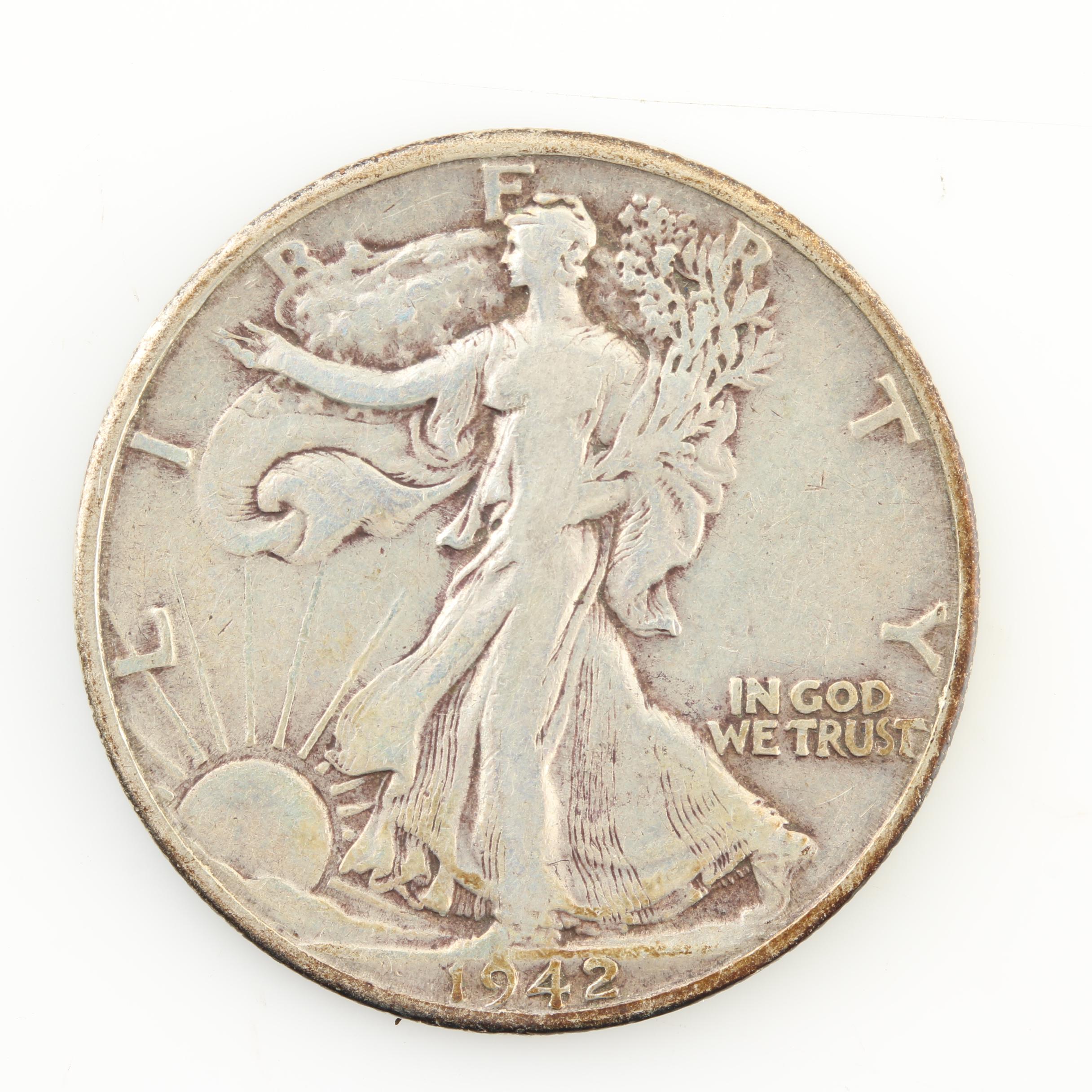 Eight Walking Liberty Silver Half Dollars from the Early 1940s