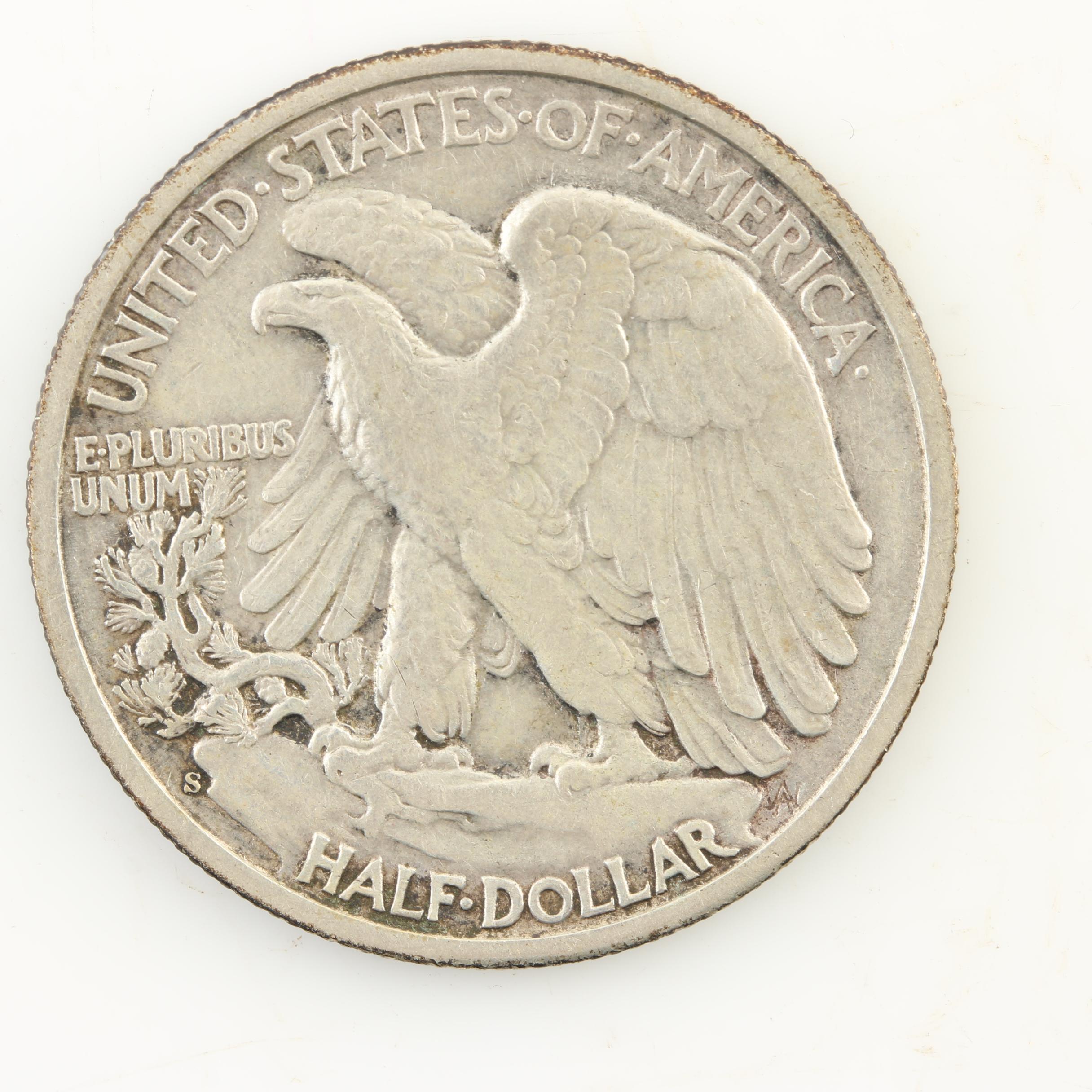 Eight Walking Liberty Silver Half Dollars from the Mid-1940s