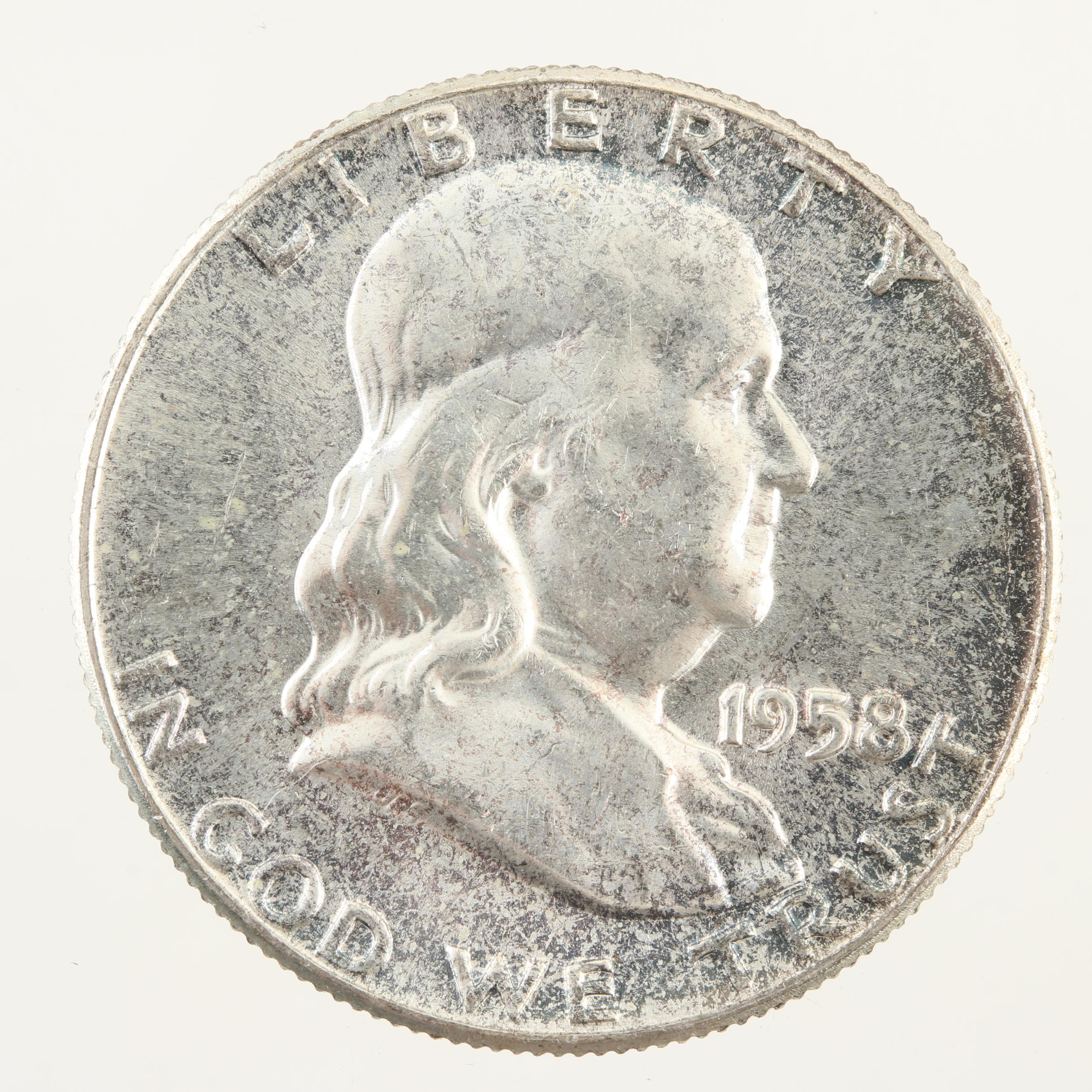 Eight Franklin Silver Half Dollars