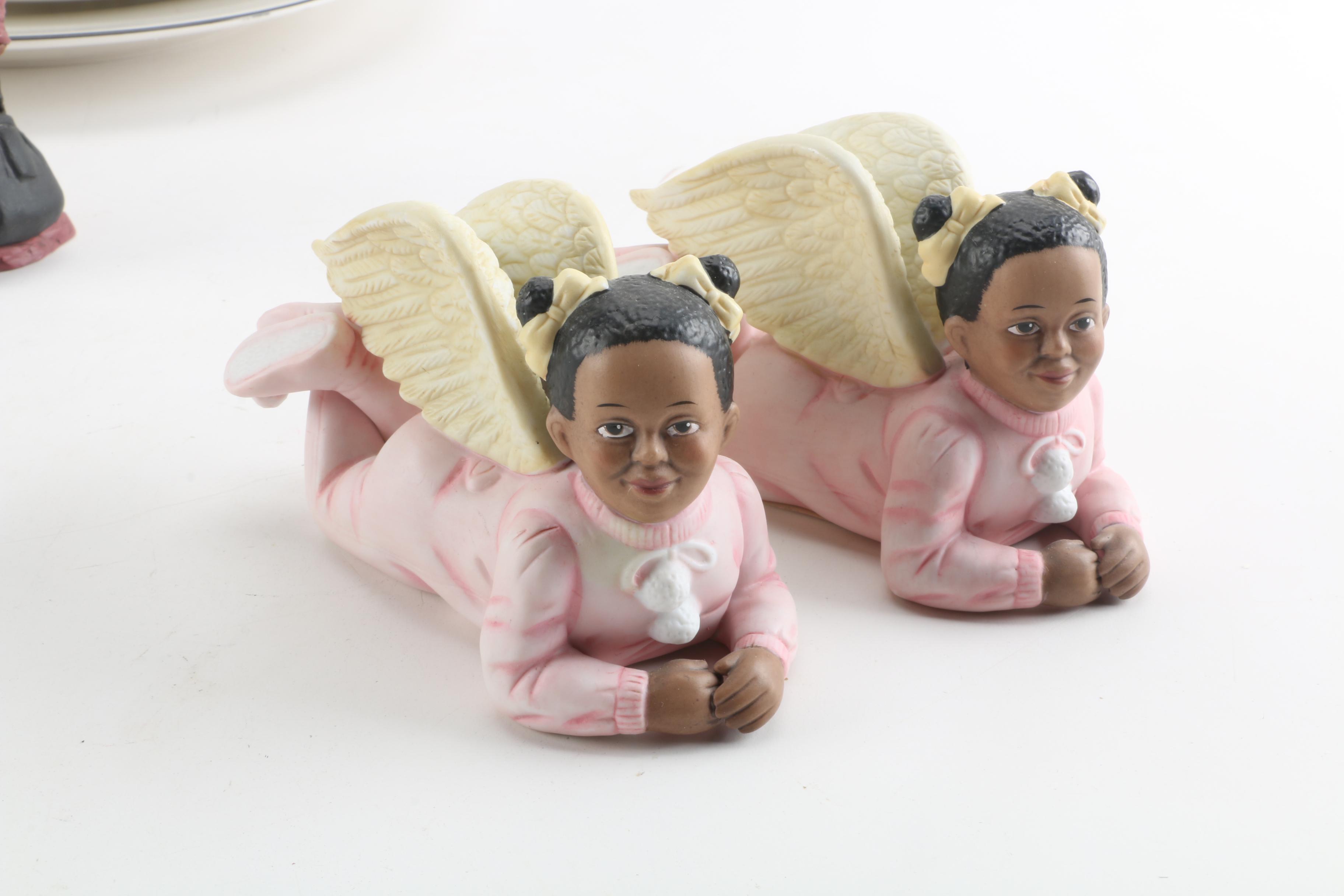 Ceramic Child Figurines and Religious-Themed Dishes