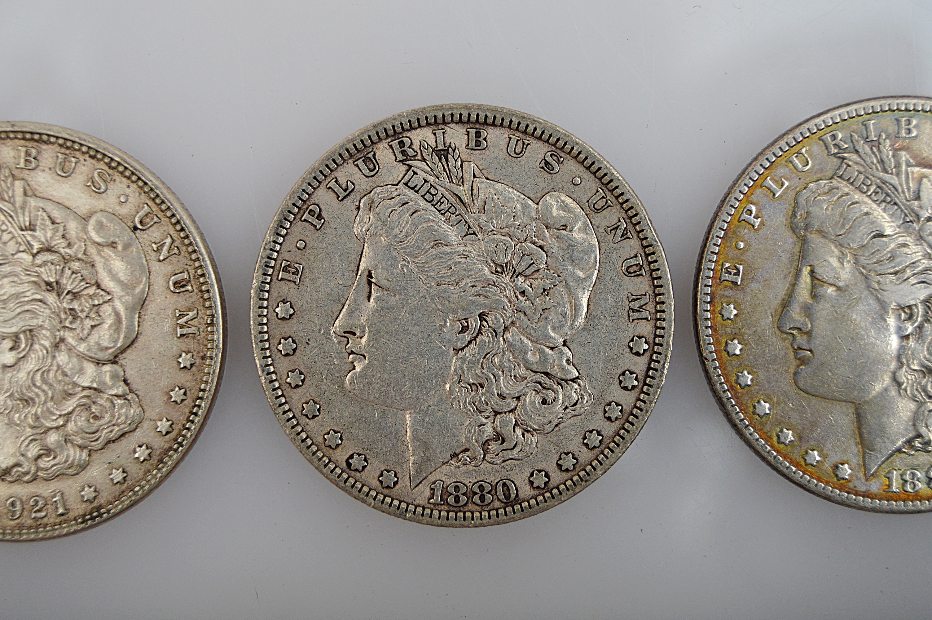 Three Morgan Silver Dollars