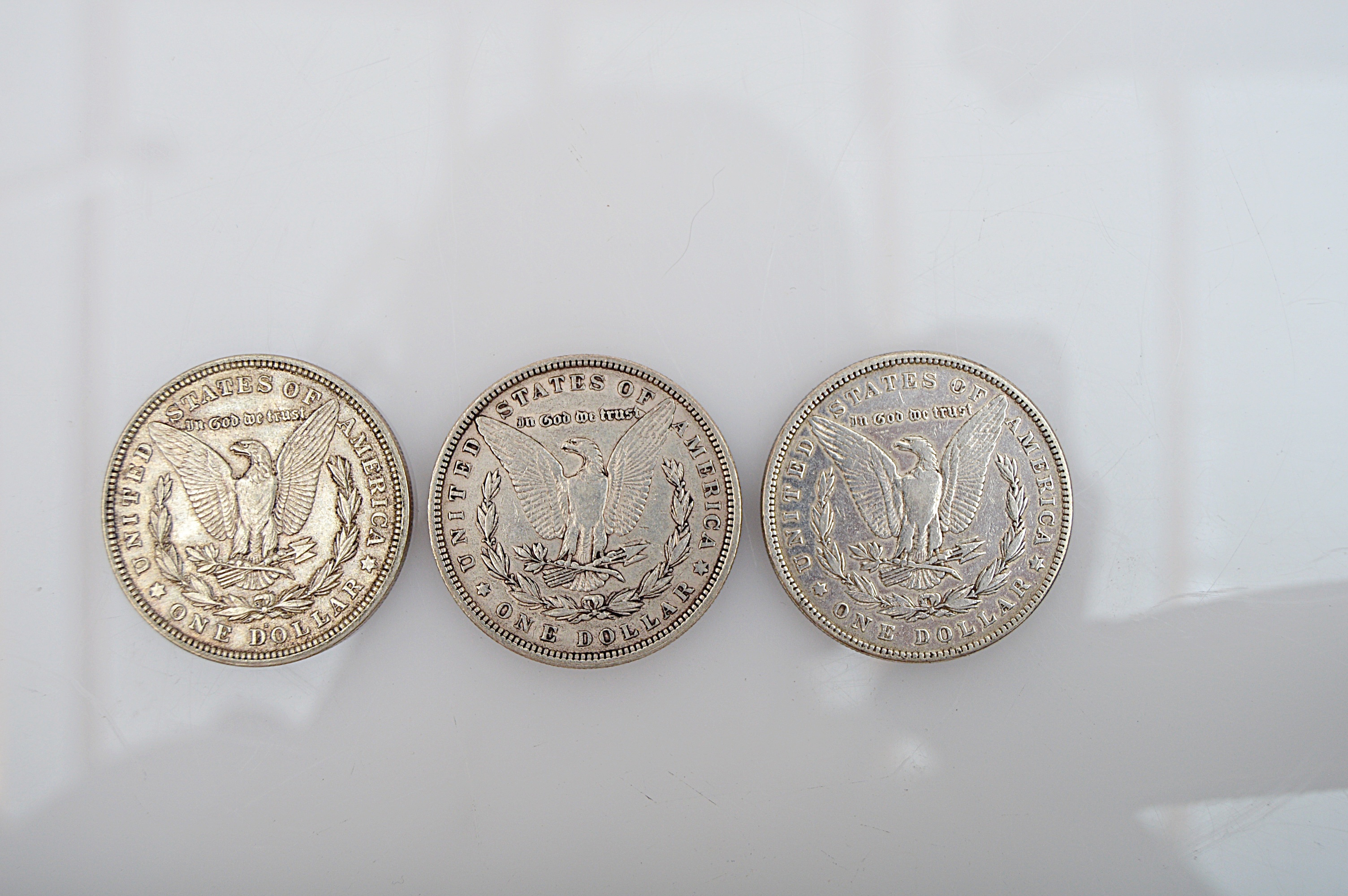 Three Morgan Silver Dollars