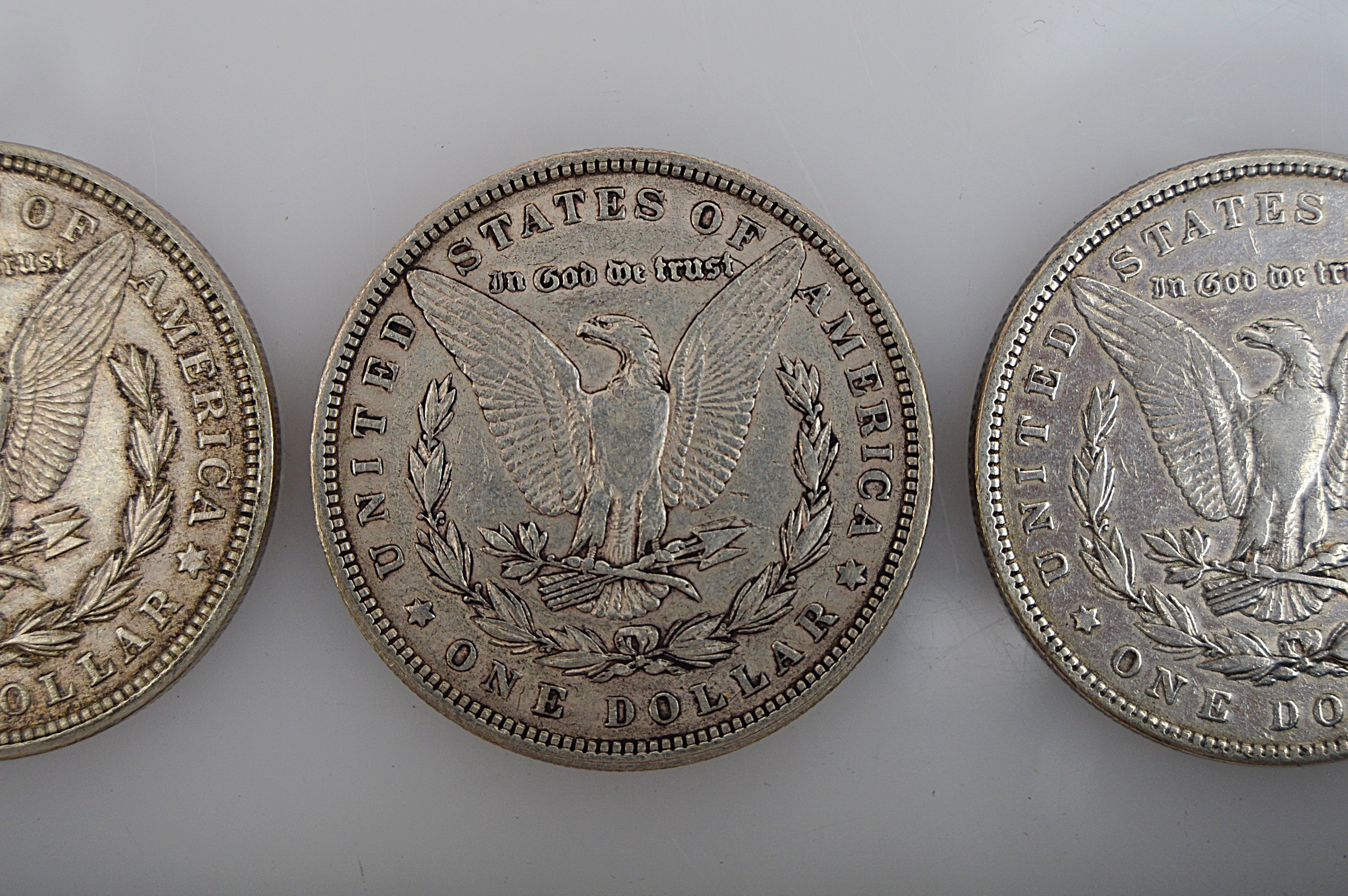 Three Morgan Silver Dollars