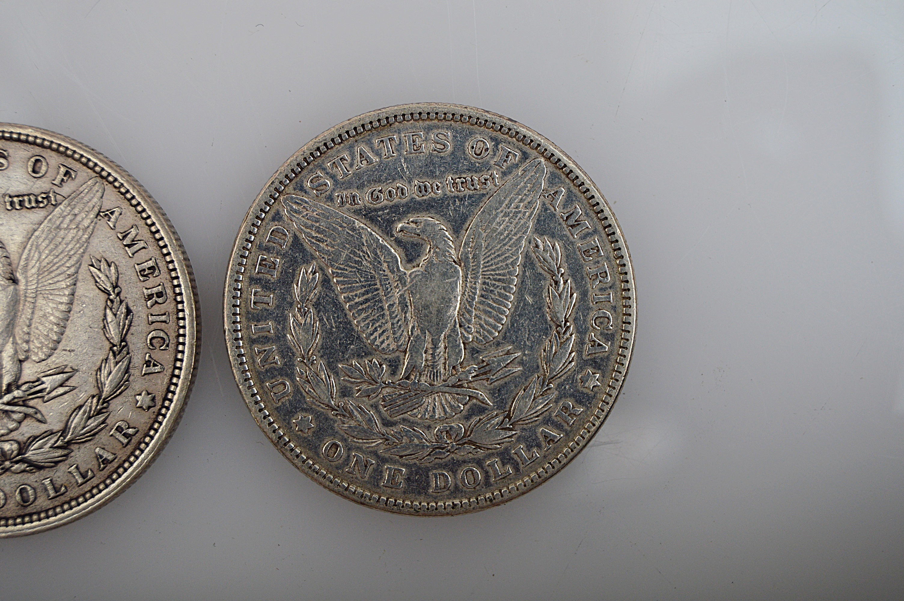 Three Morgan Silver Dollars