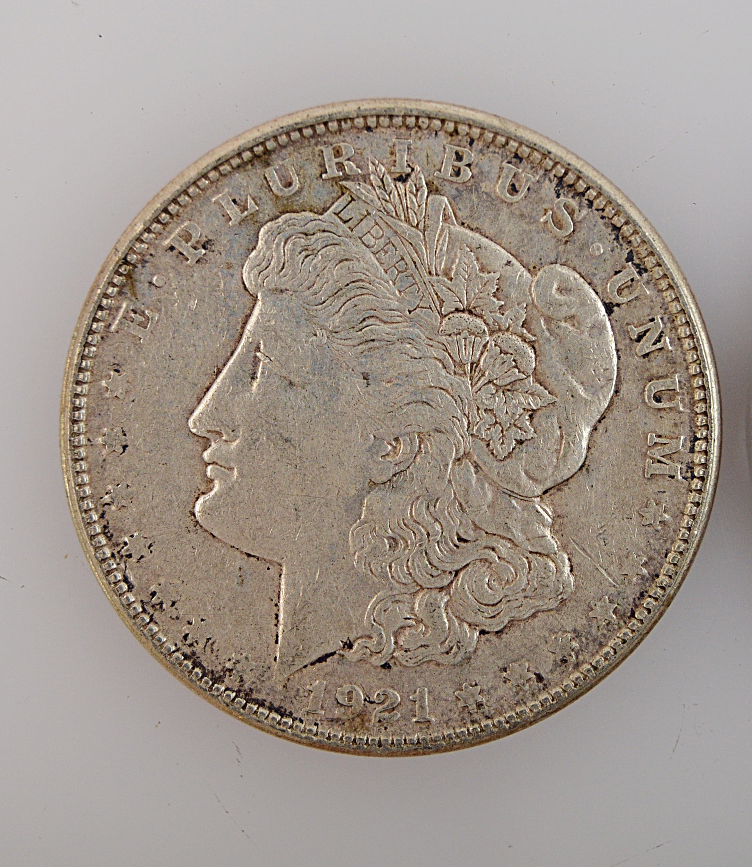 Three Morgan Silver Dollars