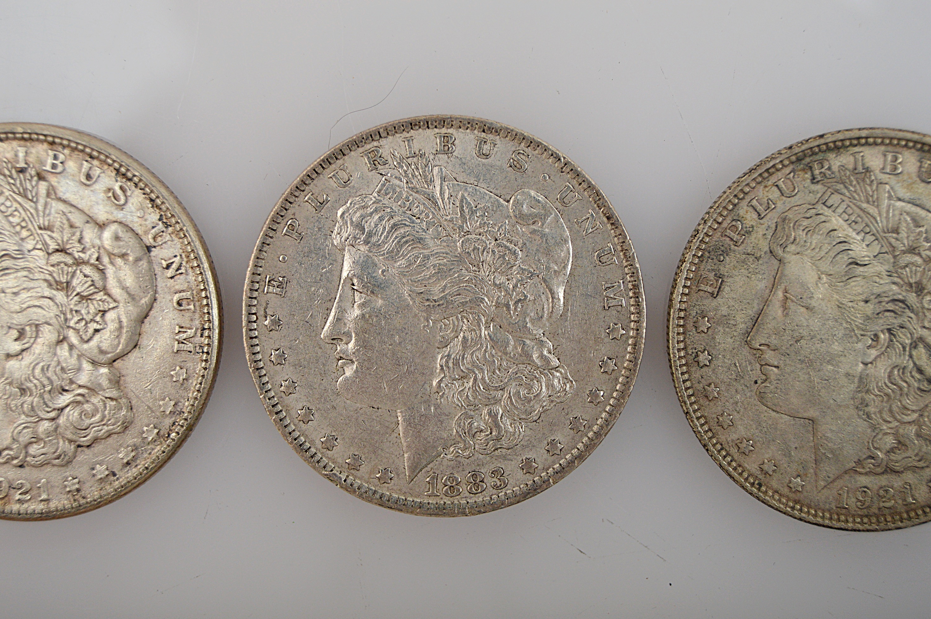 Three Morgan Silver Dollars