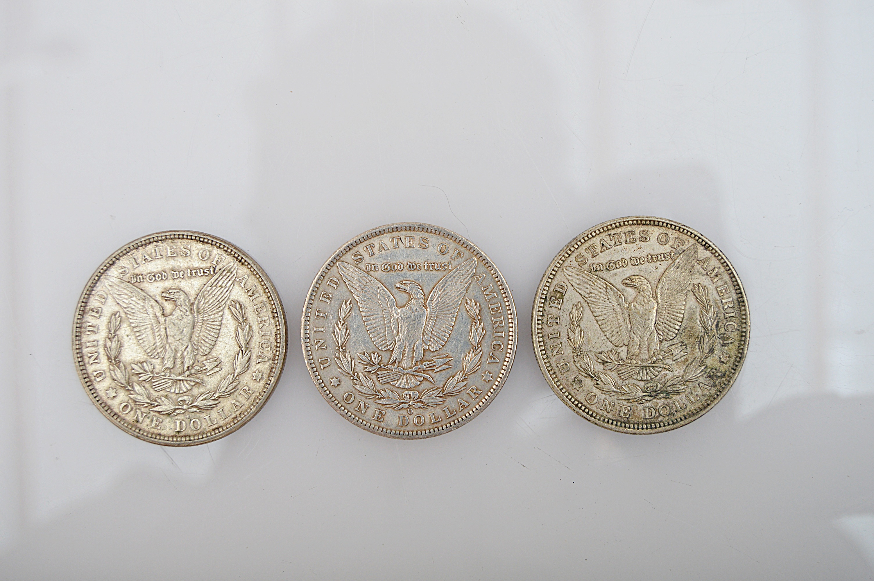 Three Morgan Silver Dollars
