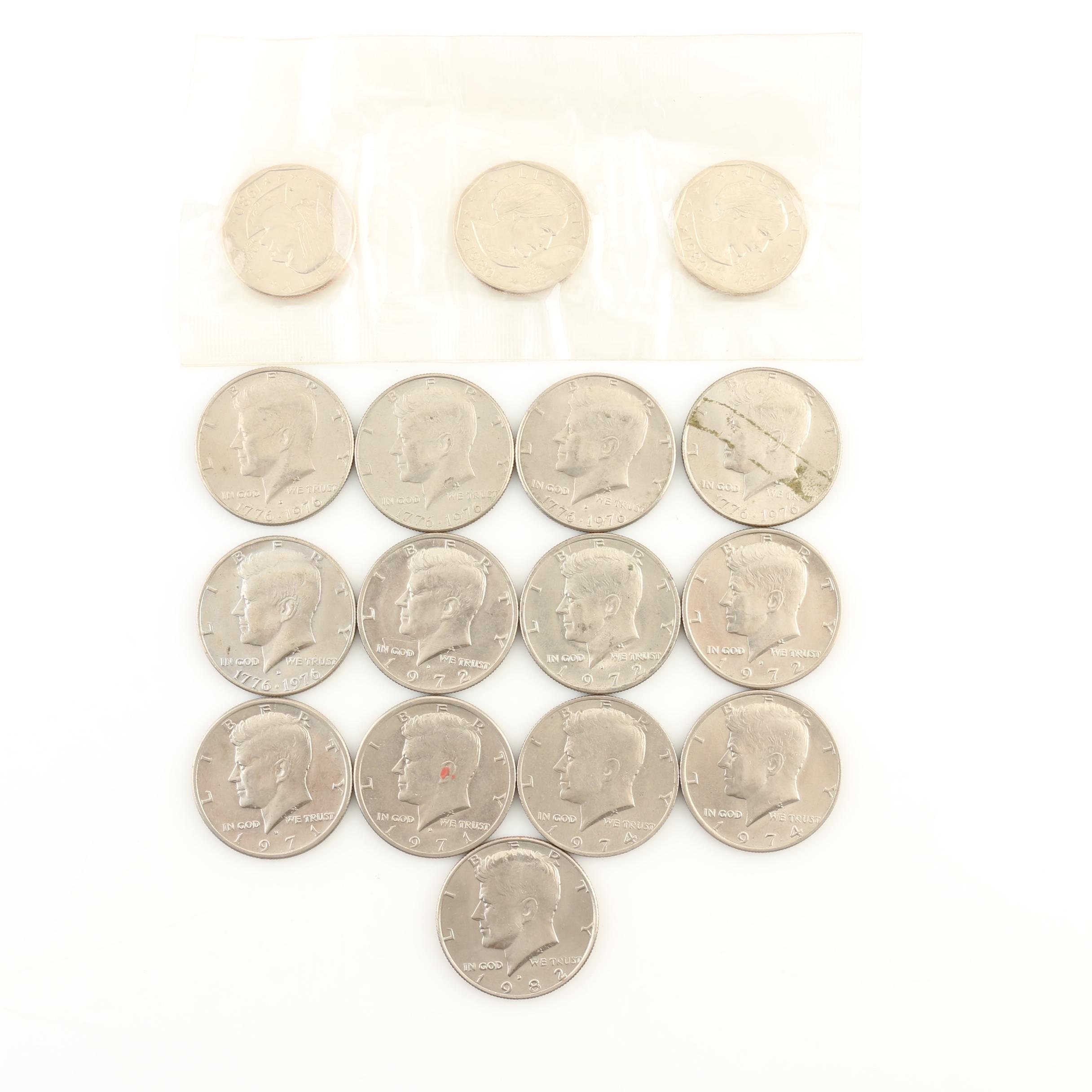 Group of Thirteen JFK Half Dollars and Three Susan B. Anthony Dollars