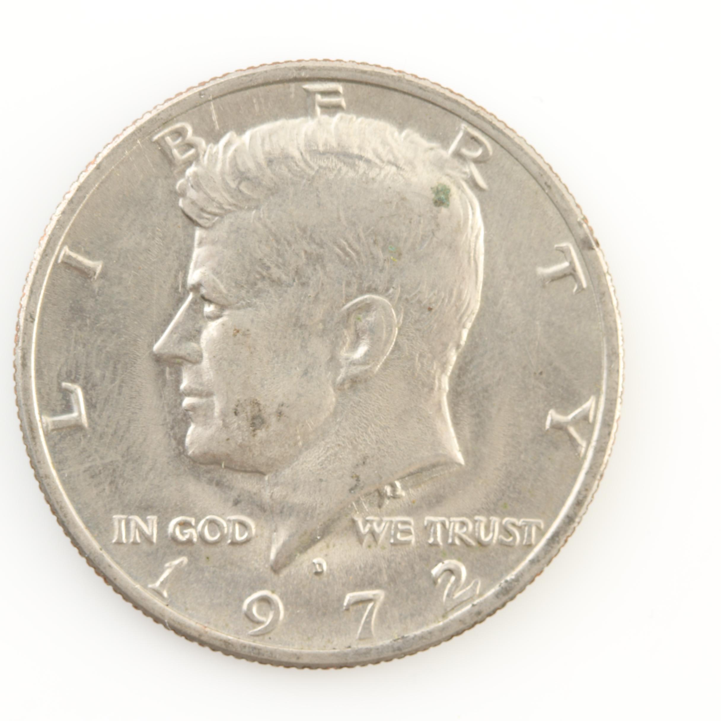 Group of Thirteen JFK Half Dollars and Three Susan B. Anthony Dollars