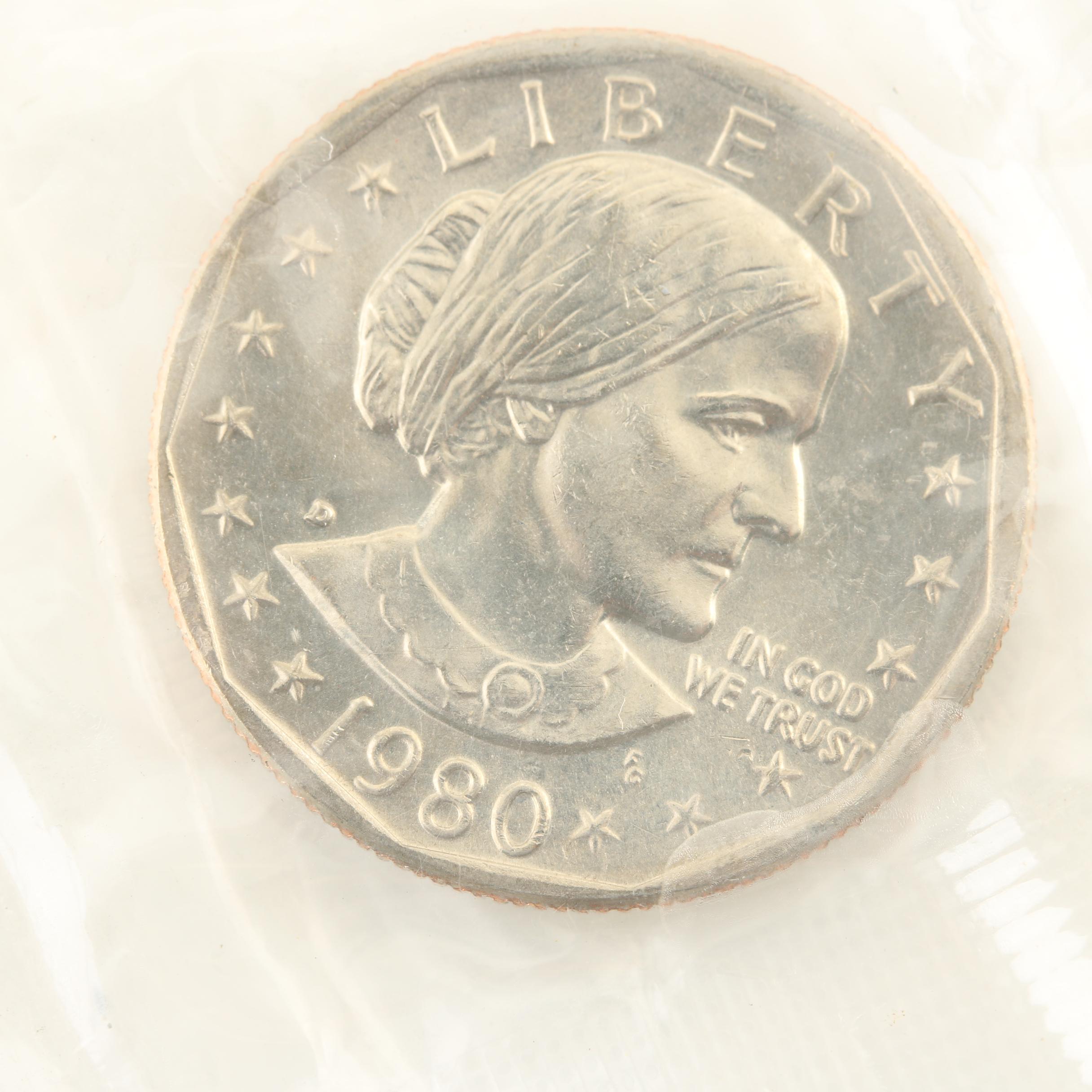 Group of Thirteen JFK Half Dollars and Three Susan B. Anthony Dollars