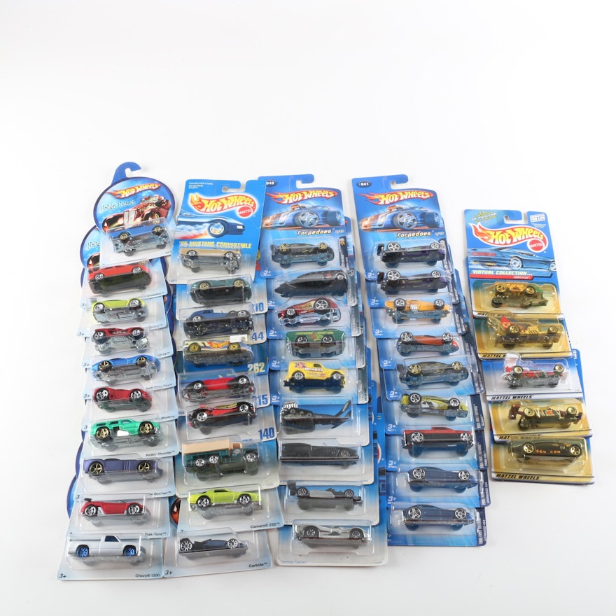 Hot Wheels Die-Cast Vehicles Including "Torpedoes" and "Holiday Hotrods"