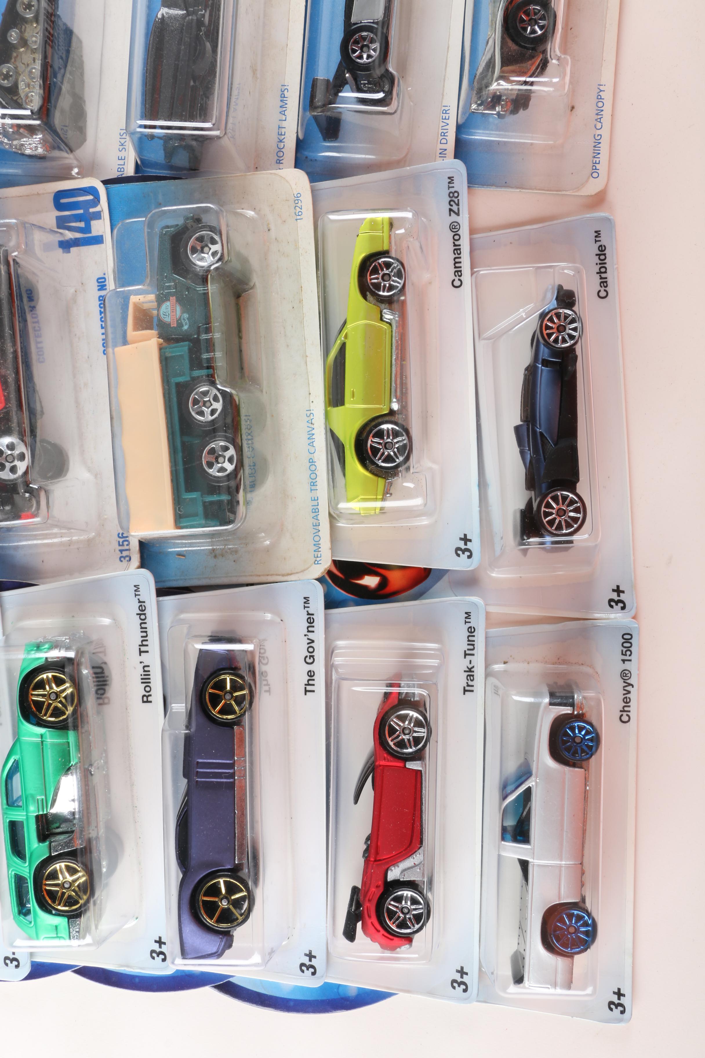 Hot Wheels Die-Cast Vehicles Including "Torpedoes" and "Holiday Hotrods"