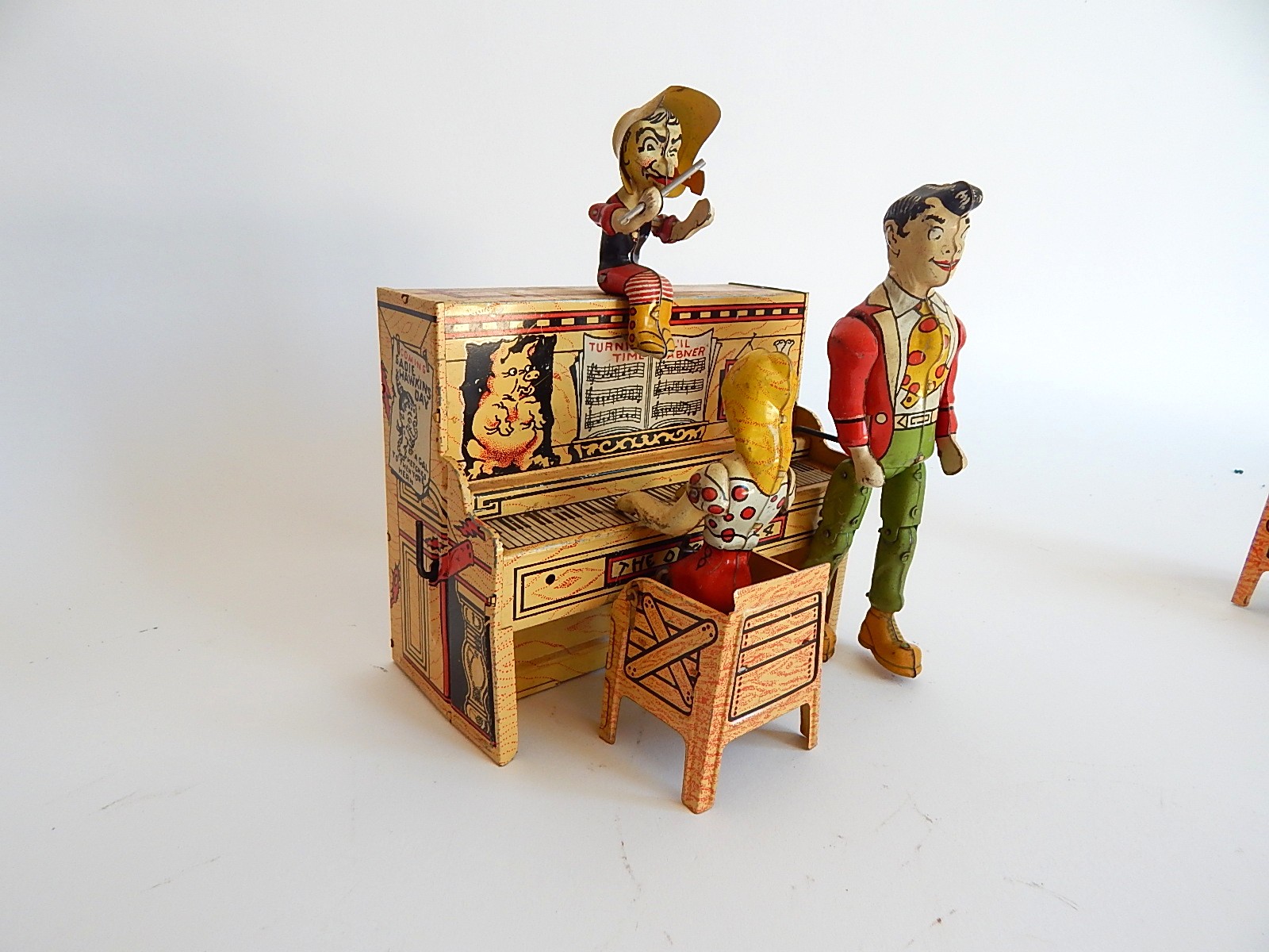 1945 "Li'l Abner" Dogpatch Band Tin Wind-Up Musical Toy by Unique Art Mfg. Co.