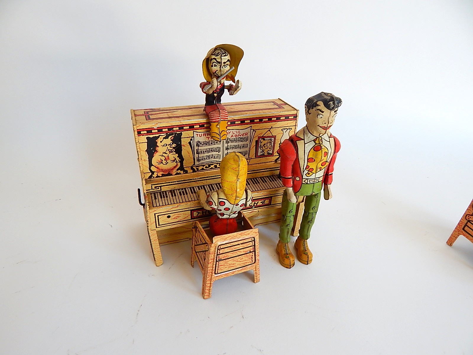 1945 "Li'l Abner" Dogpatch Band Tin Wind-Up Musical Toy by Unique Art Mfg. Co.