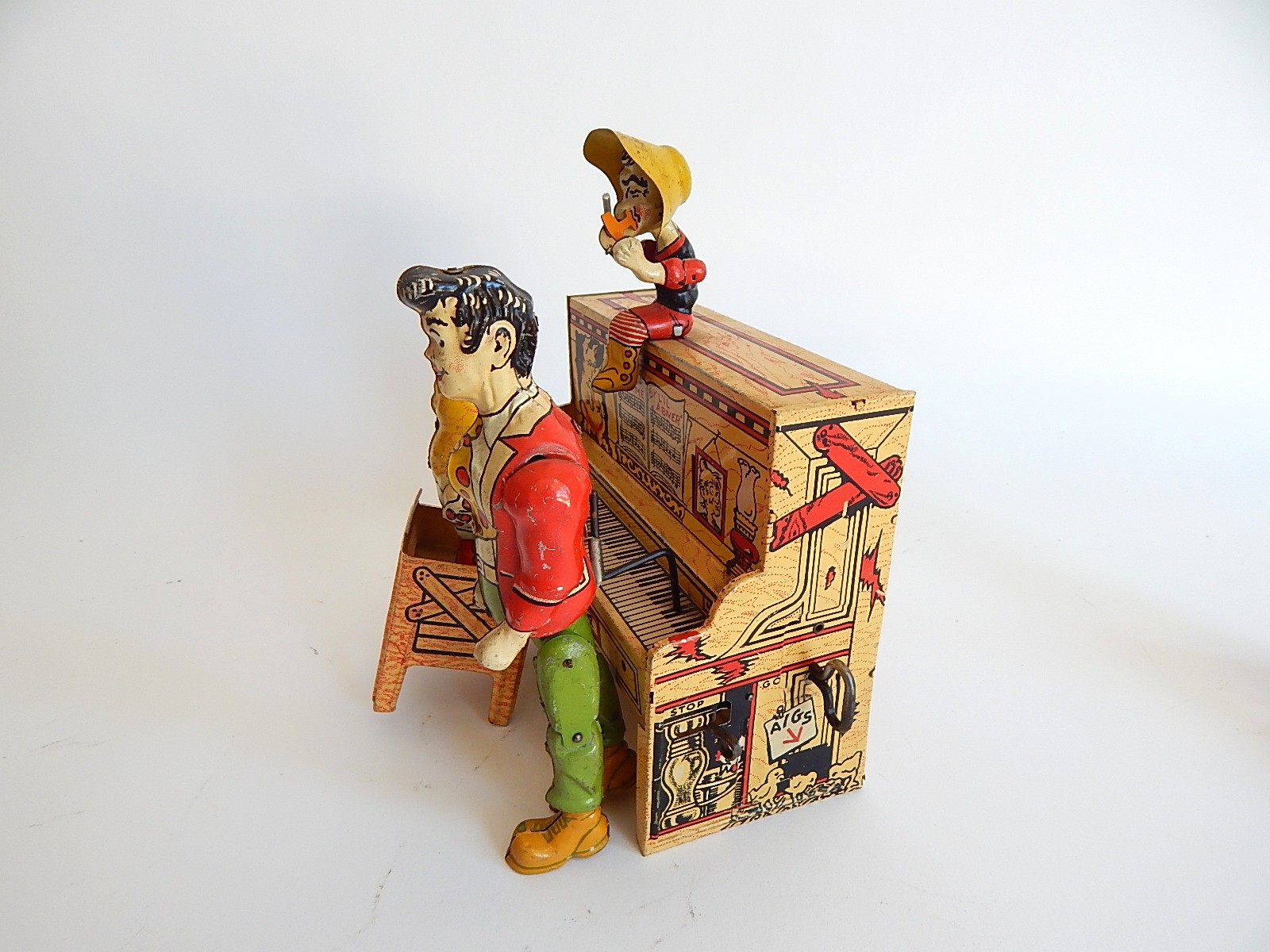 1945 "Li'l Abner" Dogpatch Band Tin Wind-Up Musical Toy by Unique Art Mfg. Co.